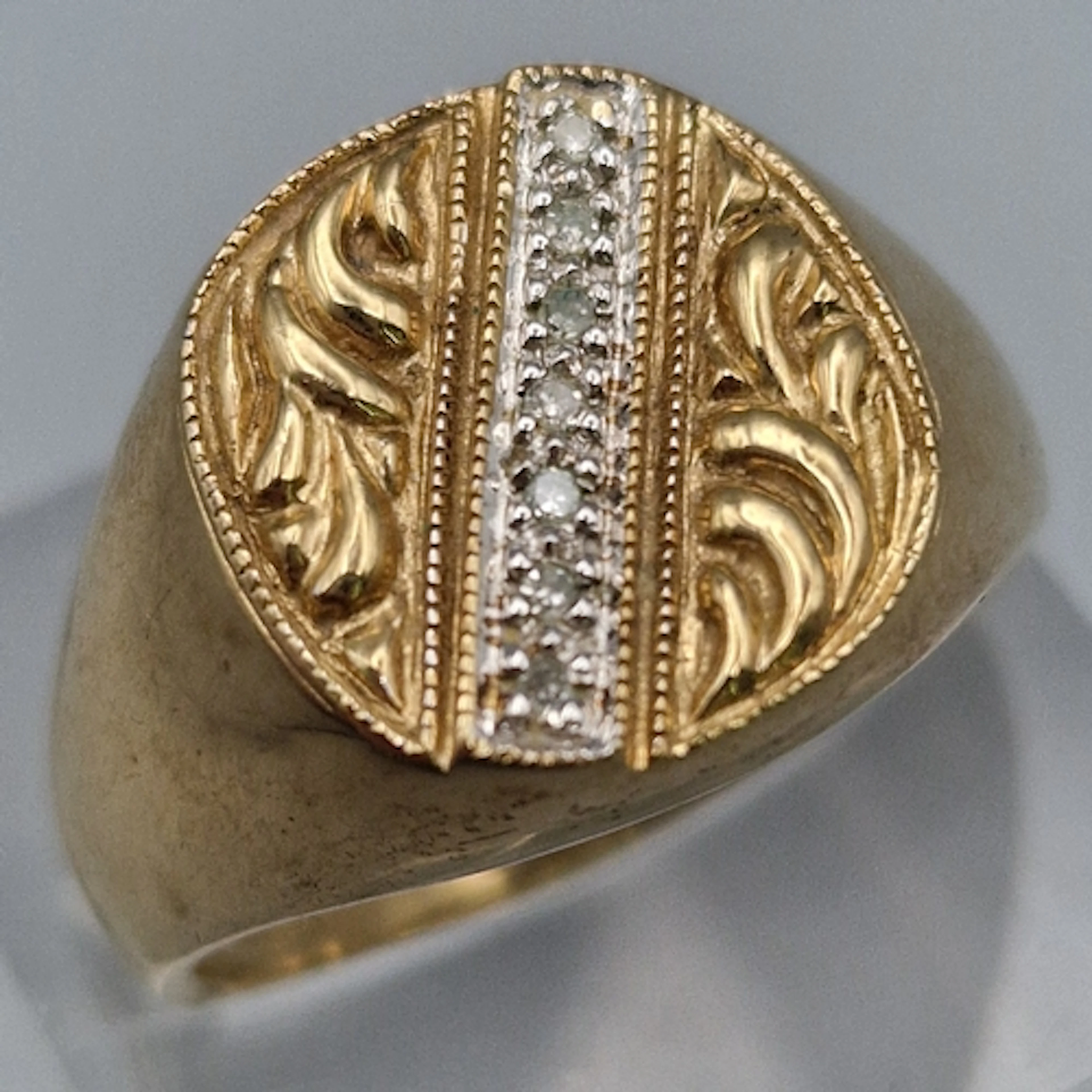 9ct gold engraved signet ring set with a cluster of tiny dia...