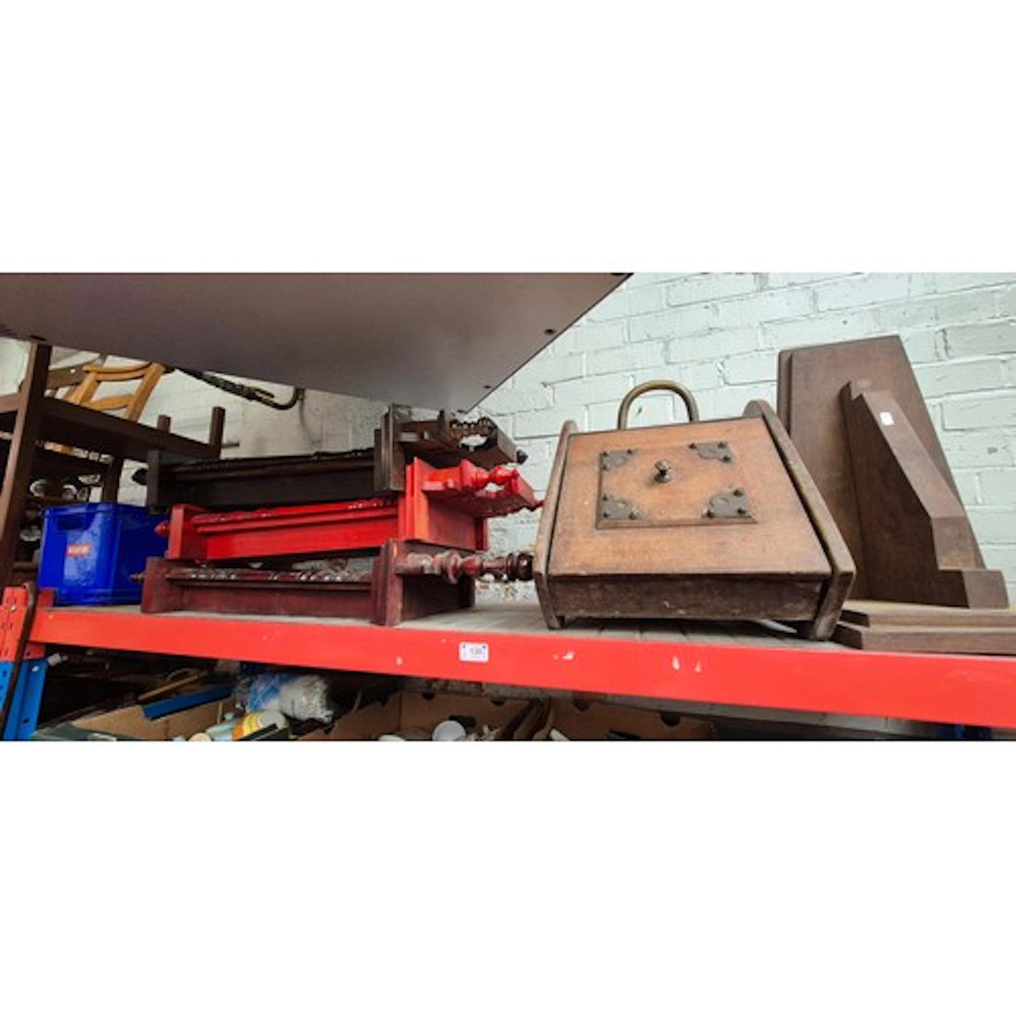 A coal box, 3 wall clocks, and a large wooden wall bracket