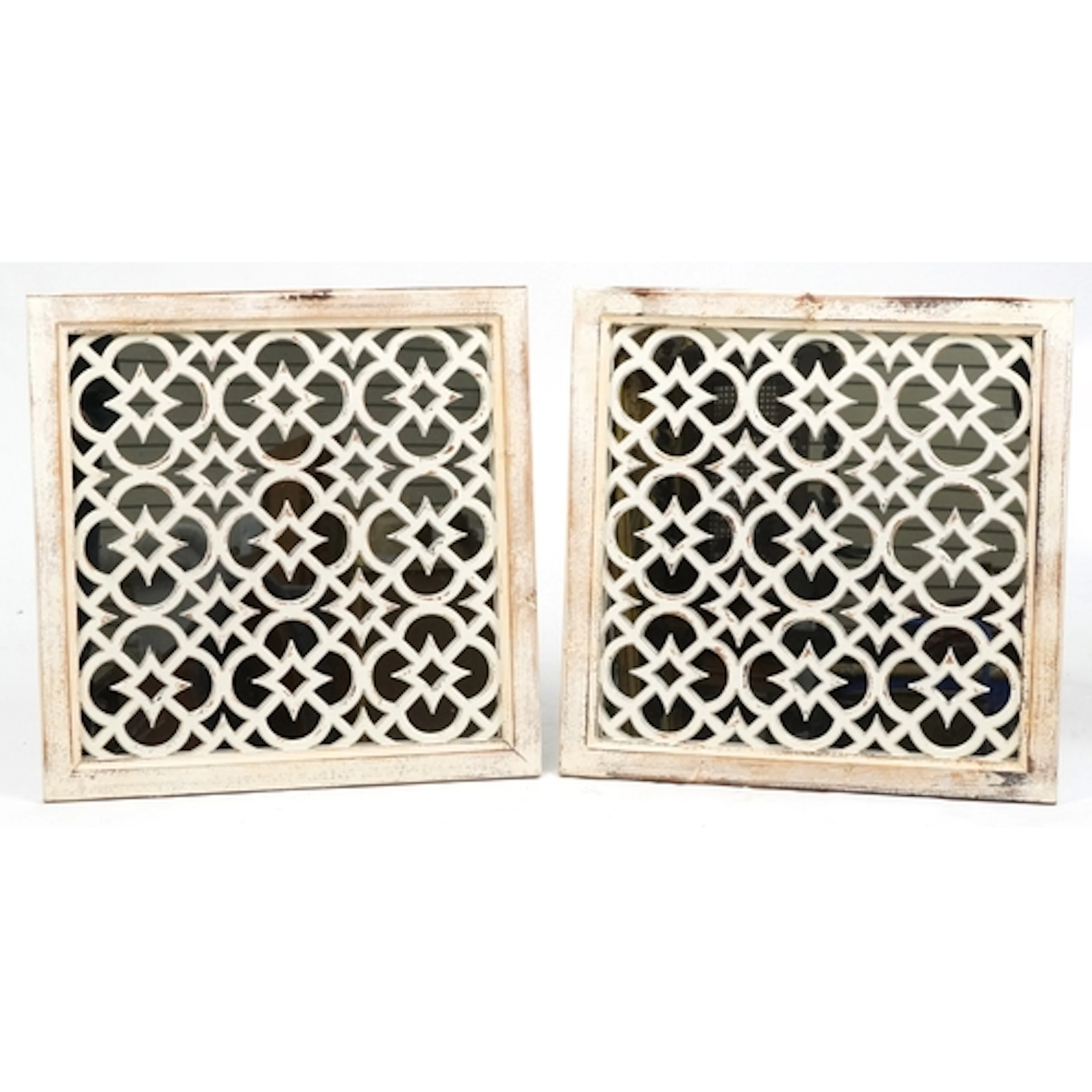 A pair of white painted square wall mirrors with fretwork pa...