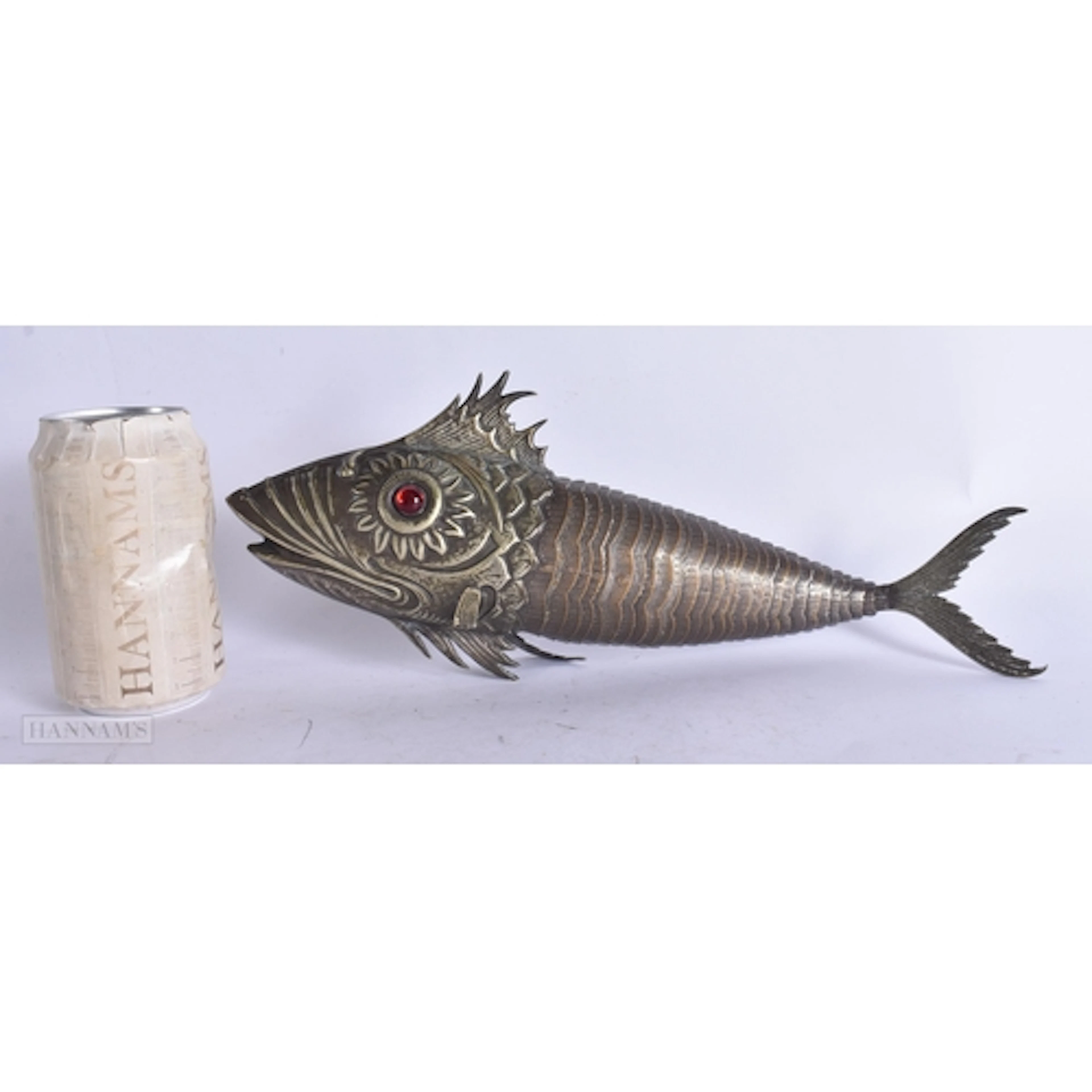 A LARGE 19TH CENTURY MIDDLE EASTERN ARTICULATED FISH with ru...