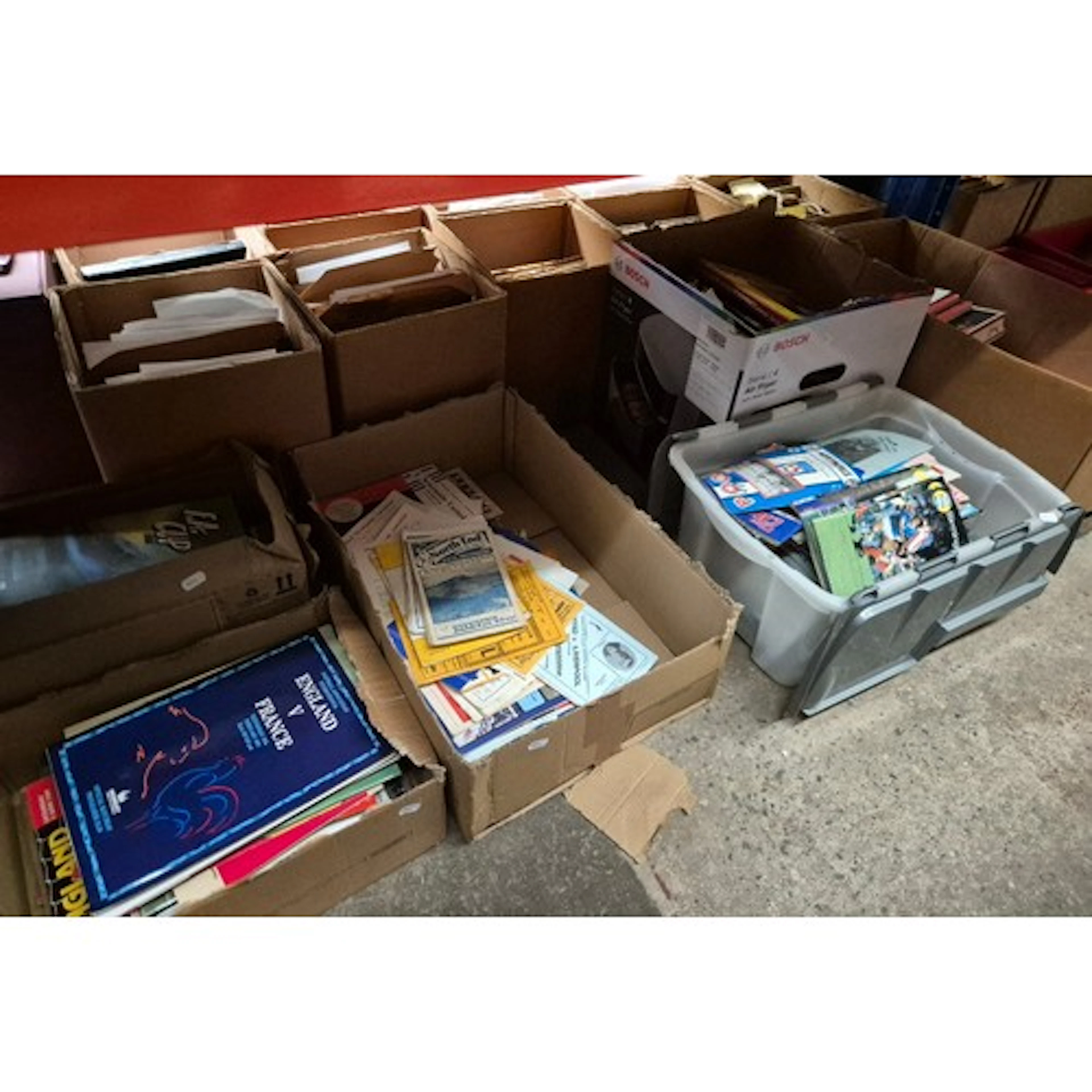 6 boxes of football programmes and books from a wide variety...