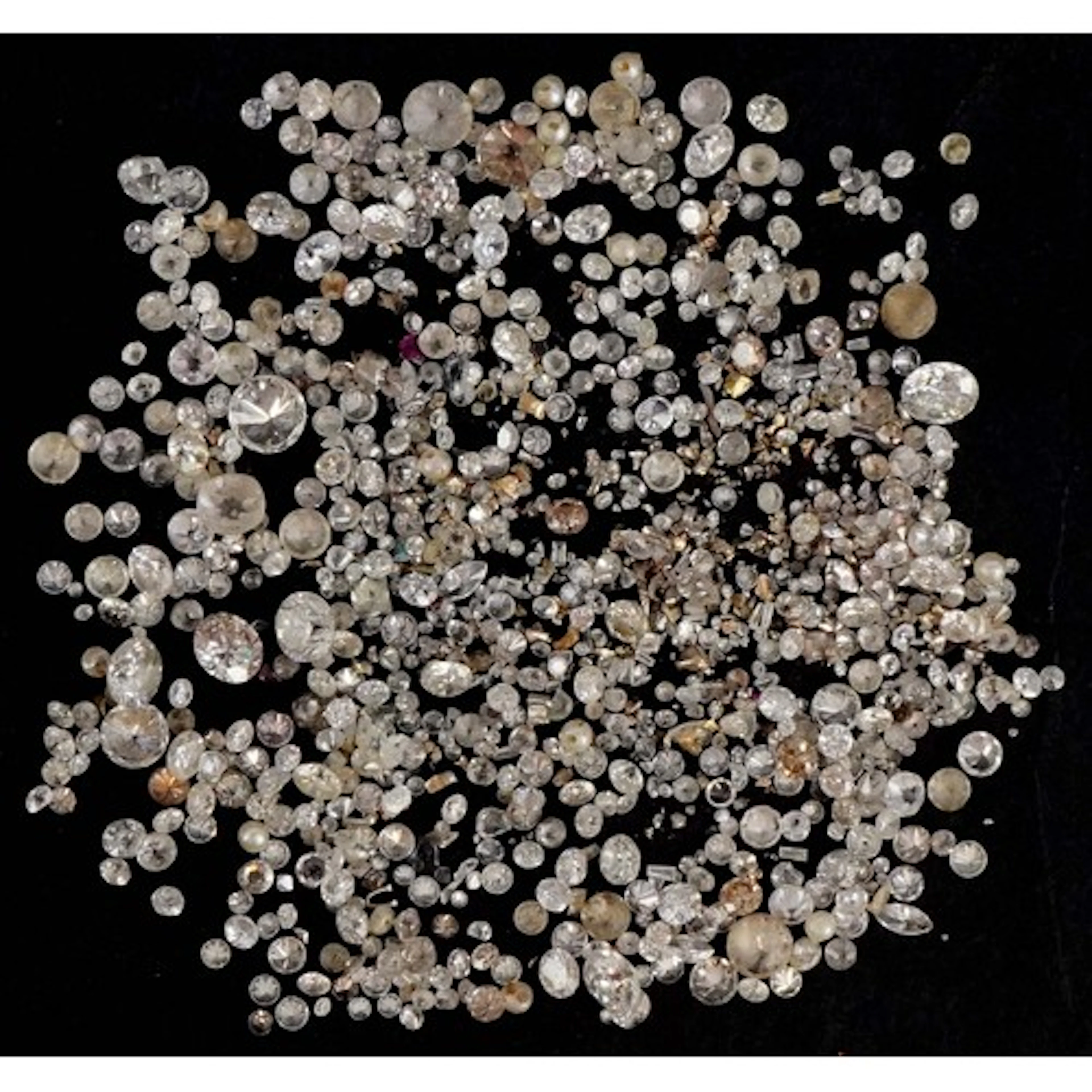 Collection of loose diamonds and clear stones, the largest d...
