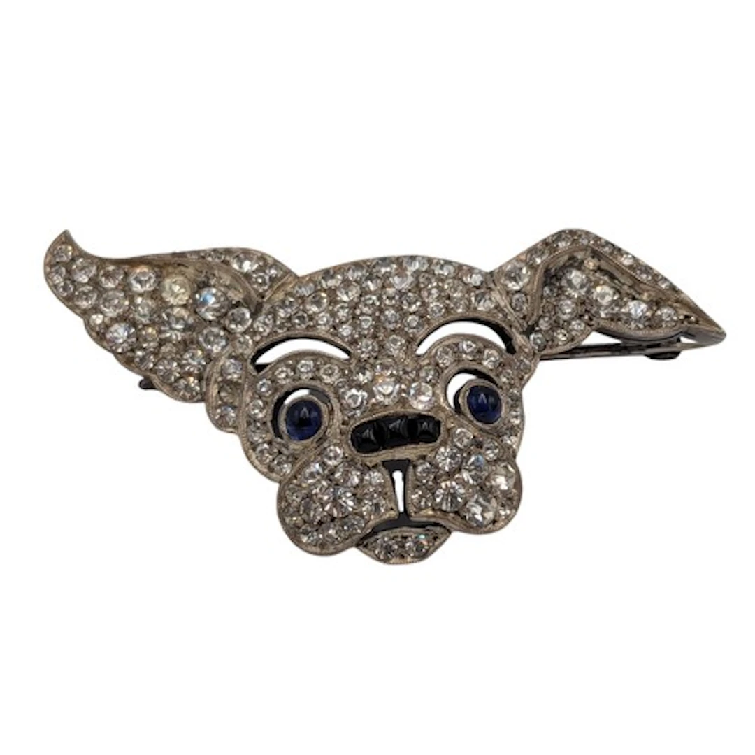 An early 20th century silver, sapphire and stone inset brooc...