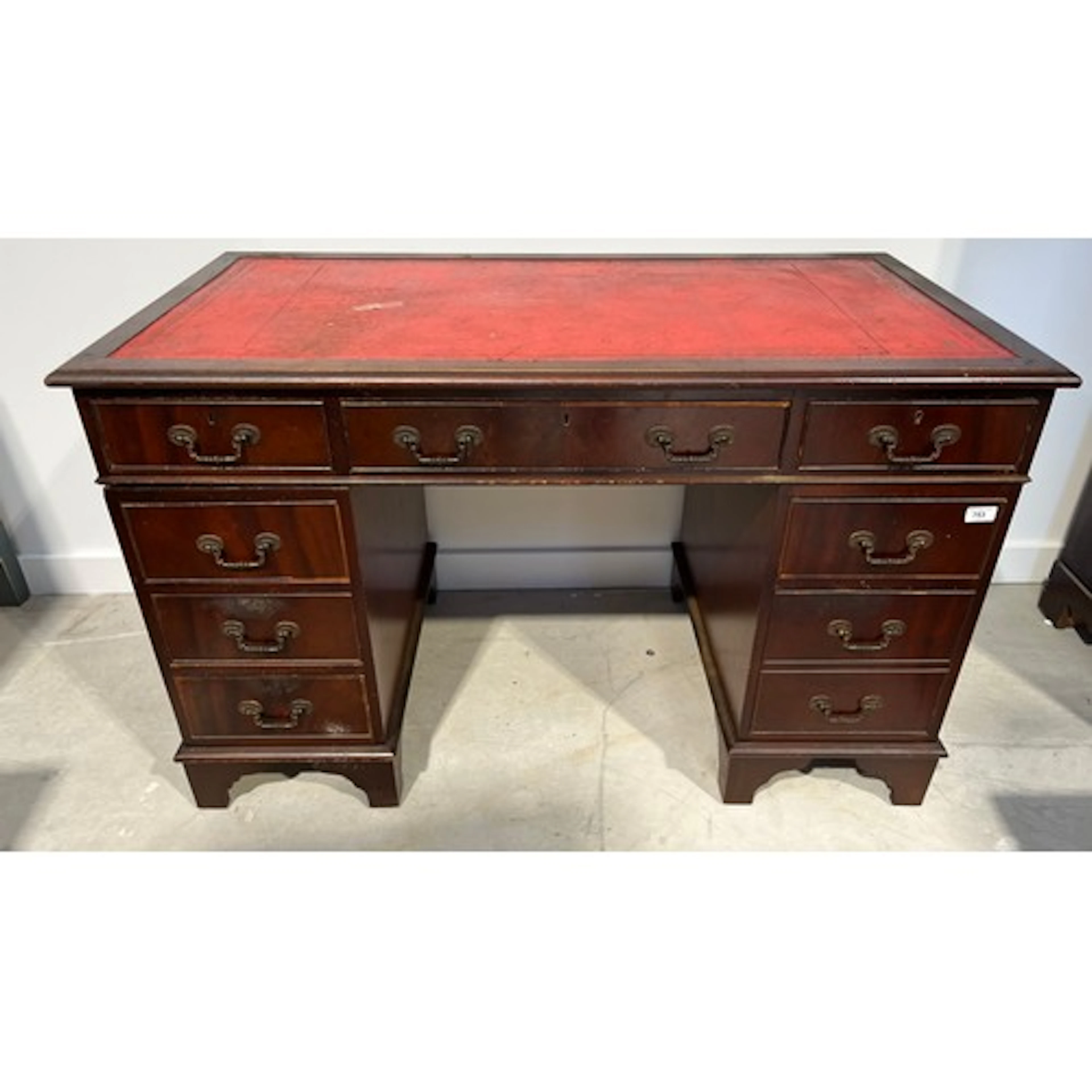 Vintage mahogany twin pedestal desk with red leather skiver,...