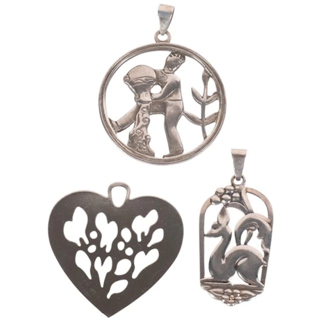 2 Danish silver pendants, and a Georg Jensen plated pendant ...
