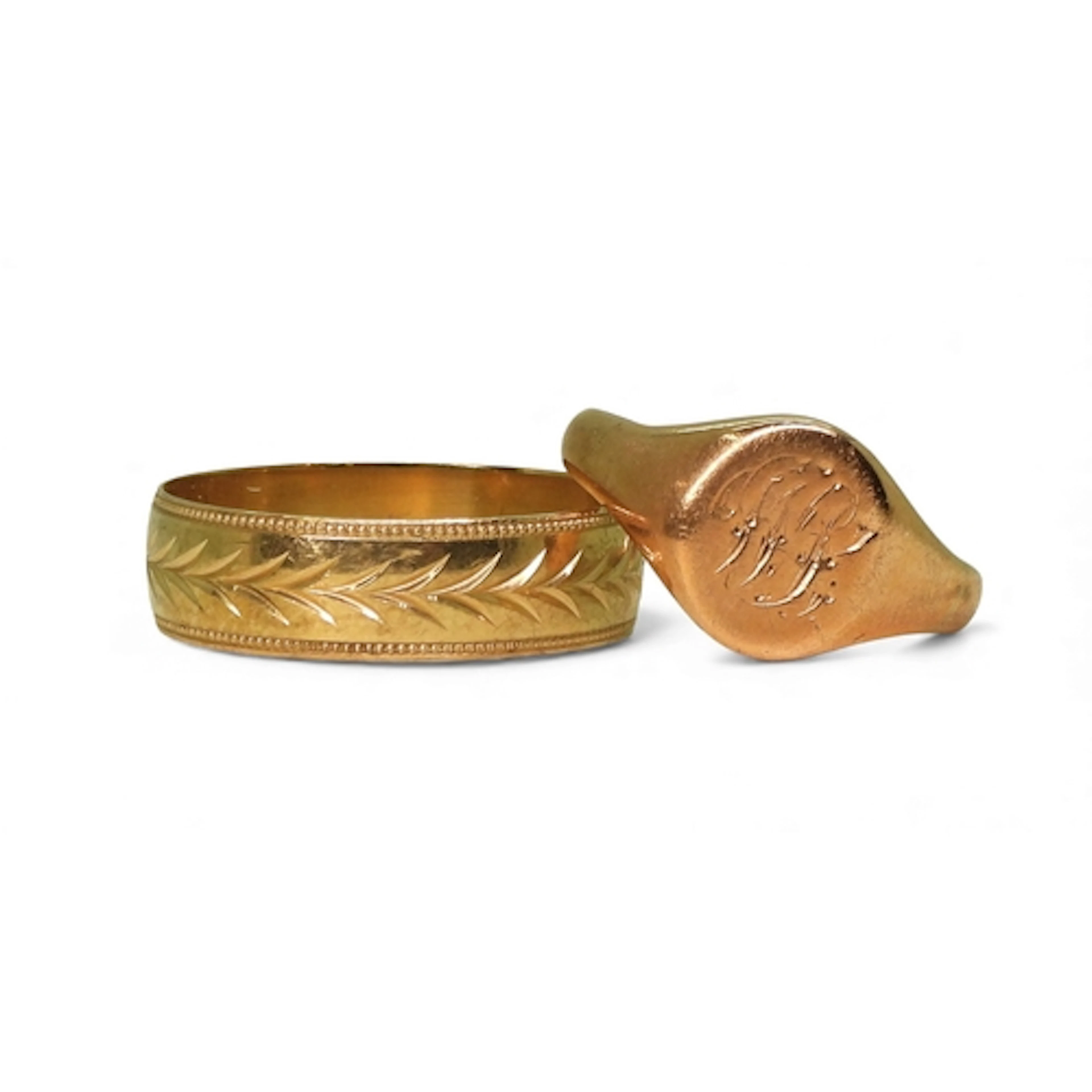 A 9ct gold engraved wedding ring, size Y, and a 9ct rose gol...