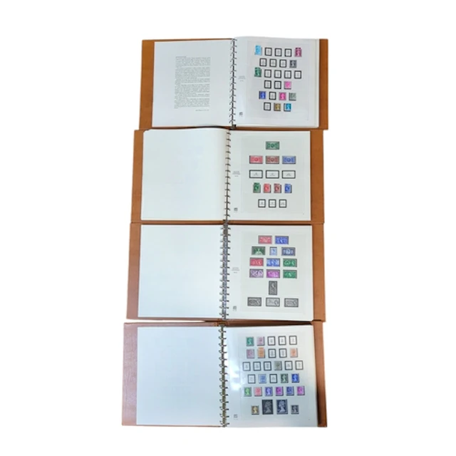 Four ring-bound albums of Great Britain postage stamps, from...