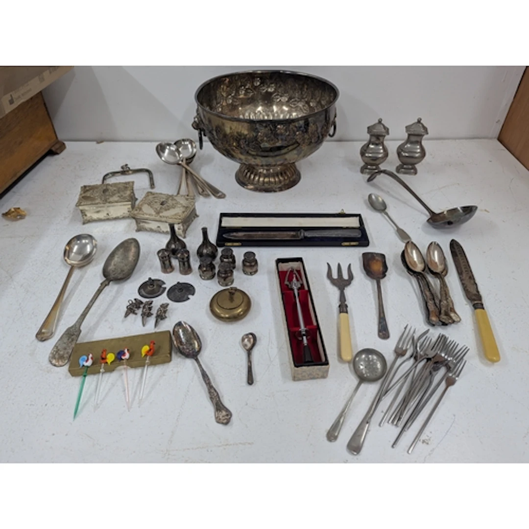 A group of silver-plated items to include a pedestal centre ...