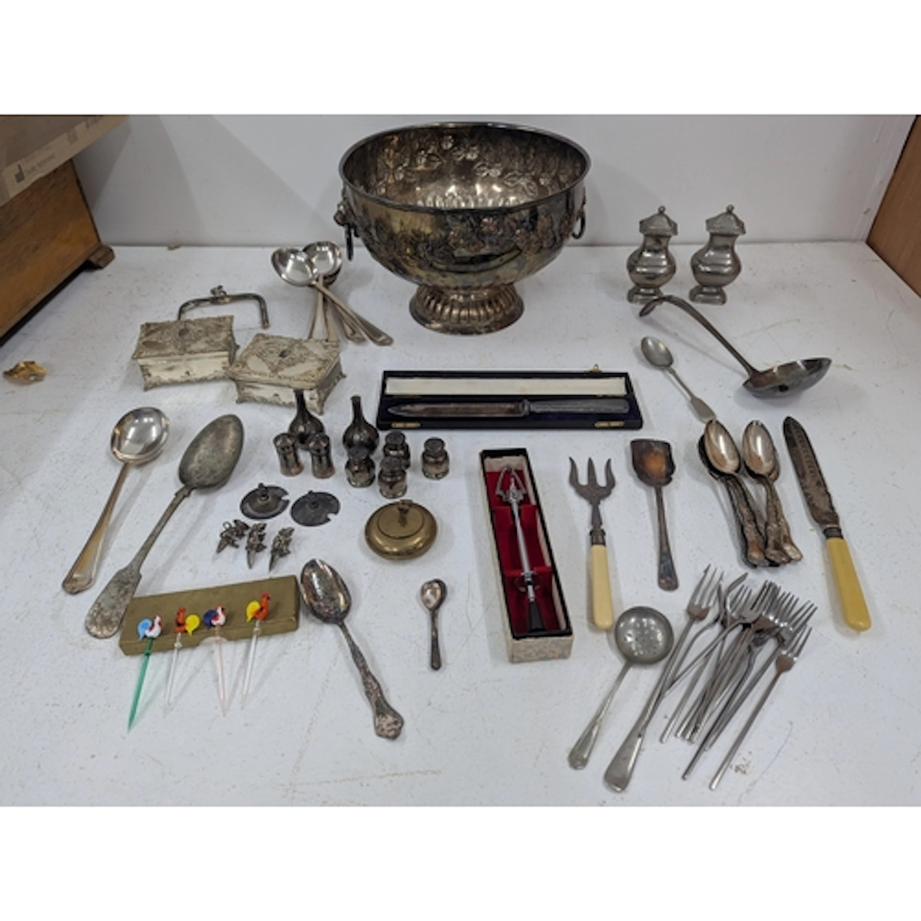 A group of silver-plated items to include a pedestal centre ...