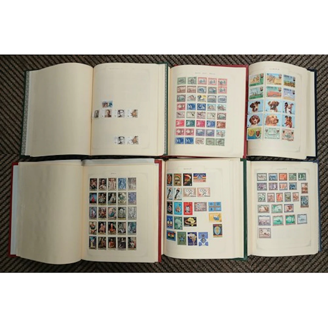 Six Philatelic albums, well filled with mainly International...