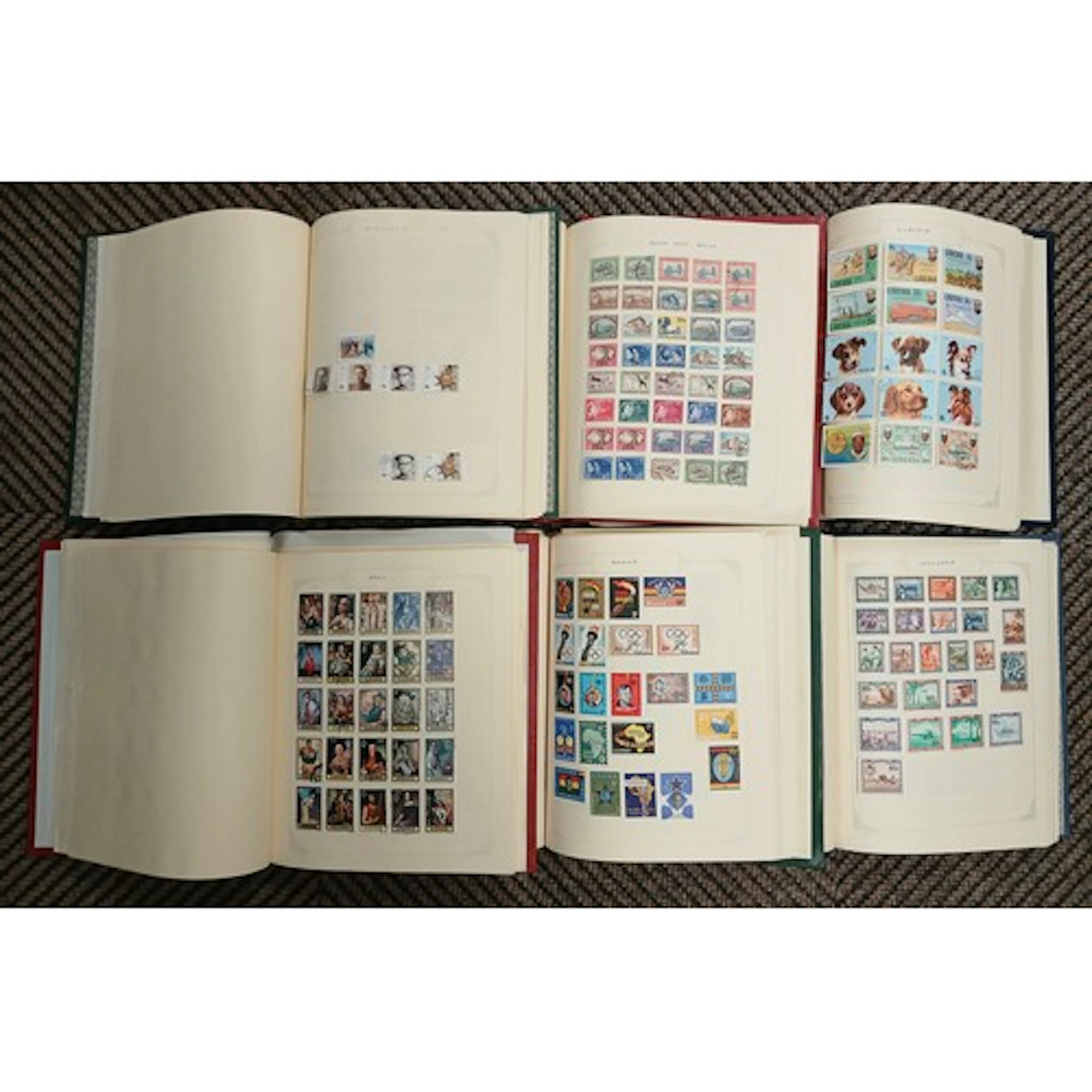 Six Philatelic albums, well filled with mainly International...