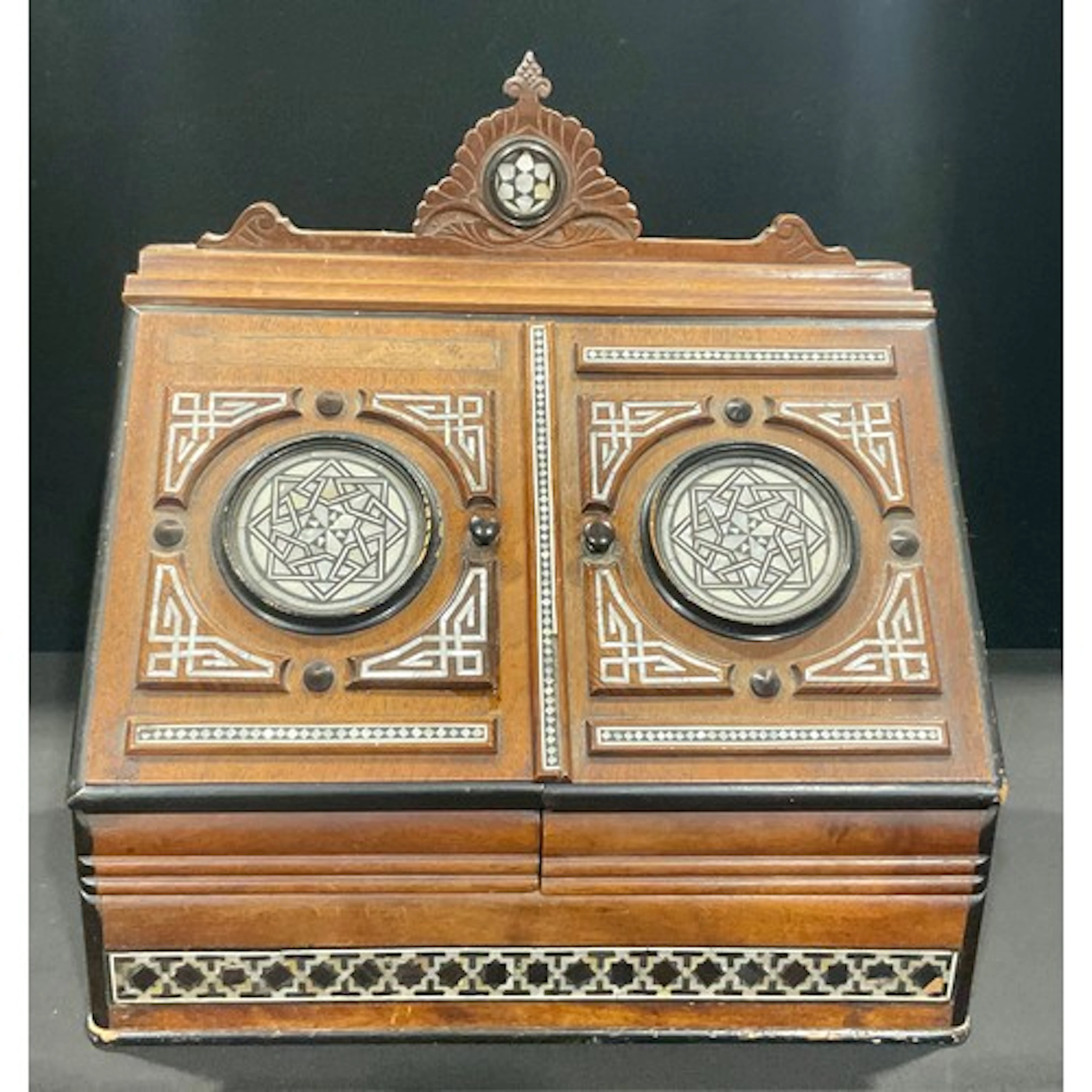 A late 19th century walnut table top stationery cabinet, mot...