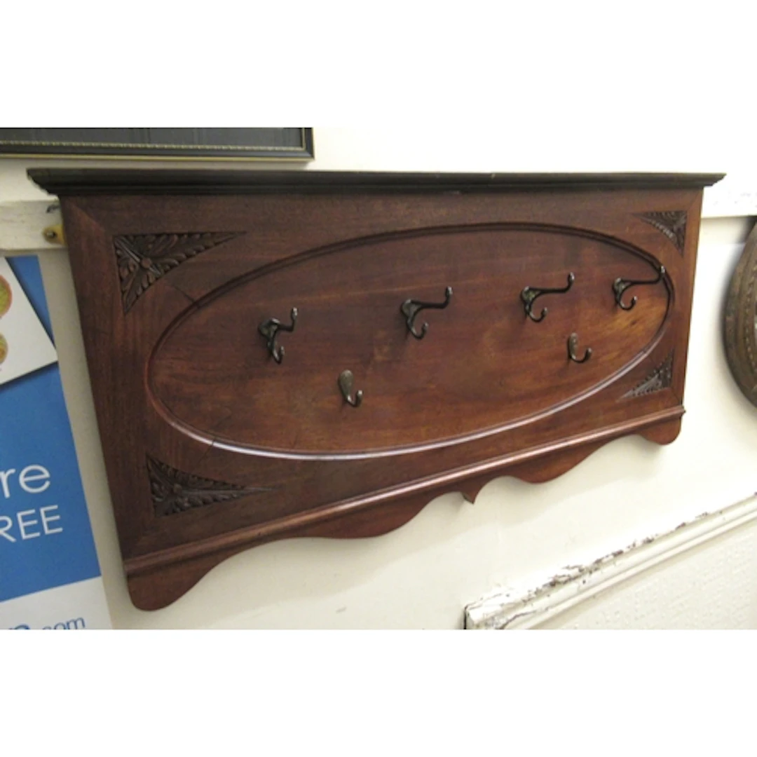 Wall mounted set of coat hooks on walnut floral carved backi...