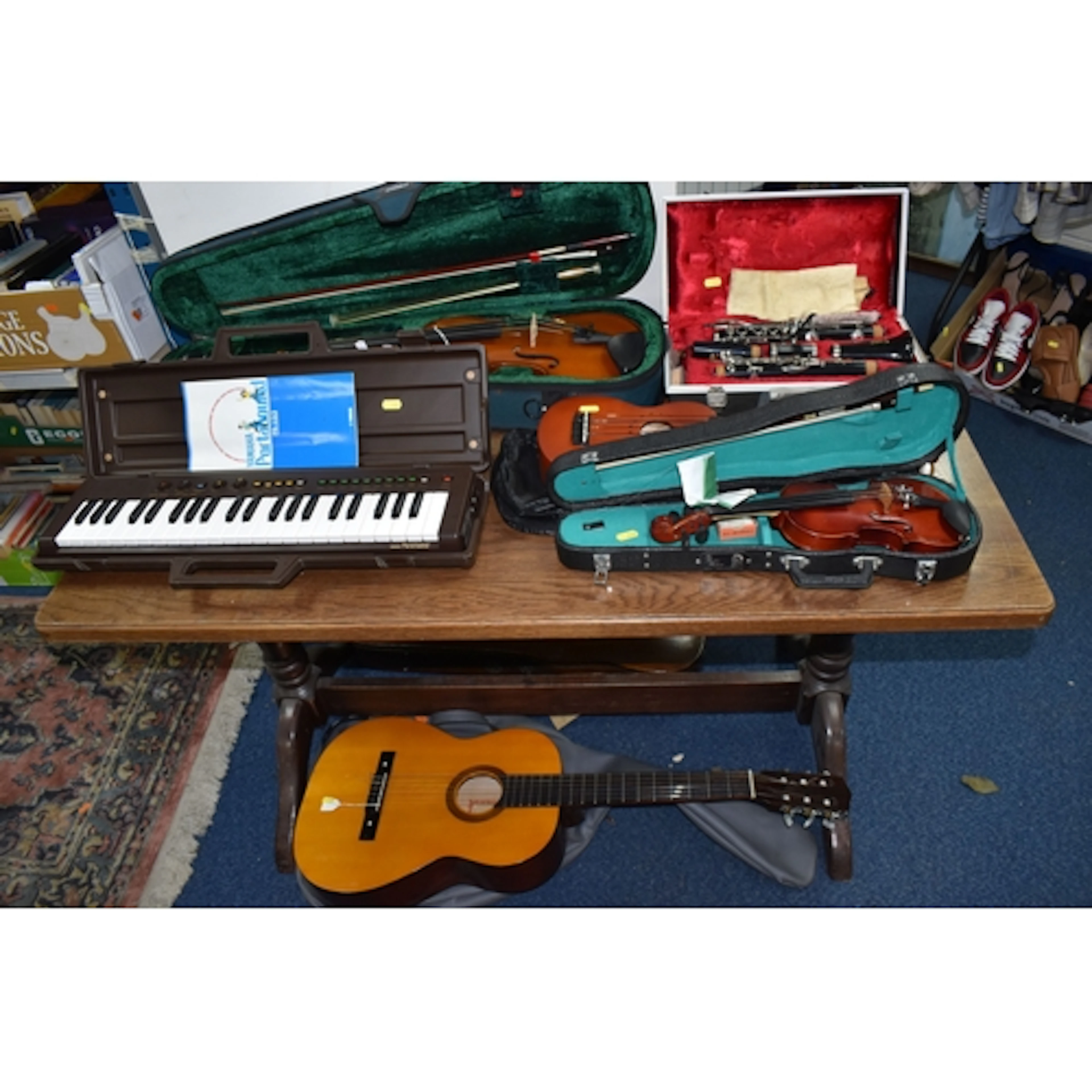 A GROUP OF MUSICAL INSTRUMENTS to include a Stagg soprano uk...