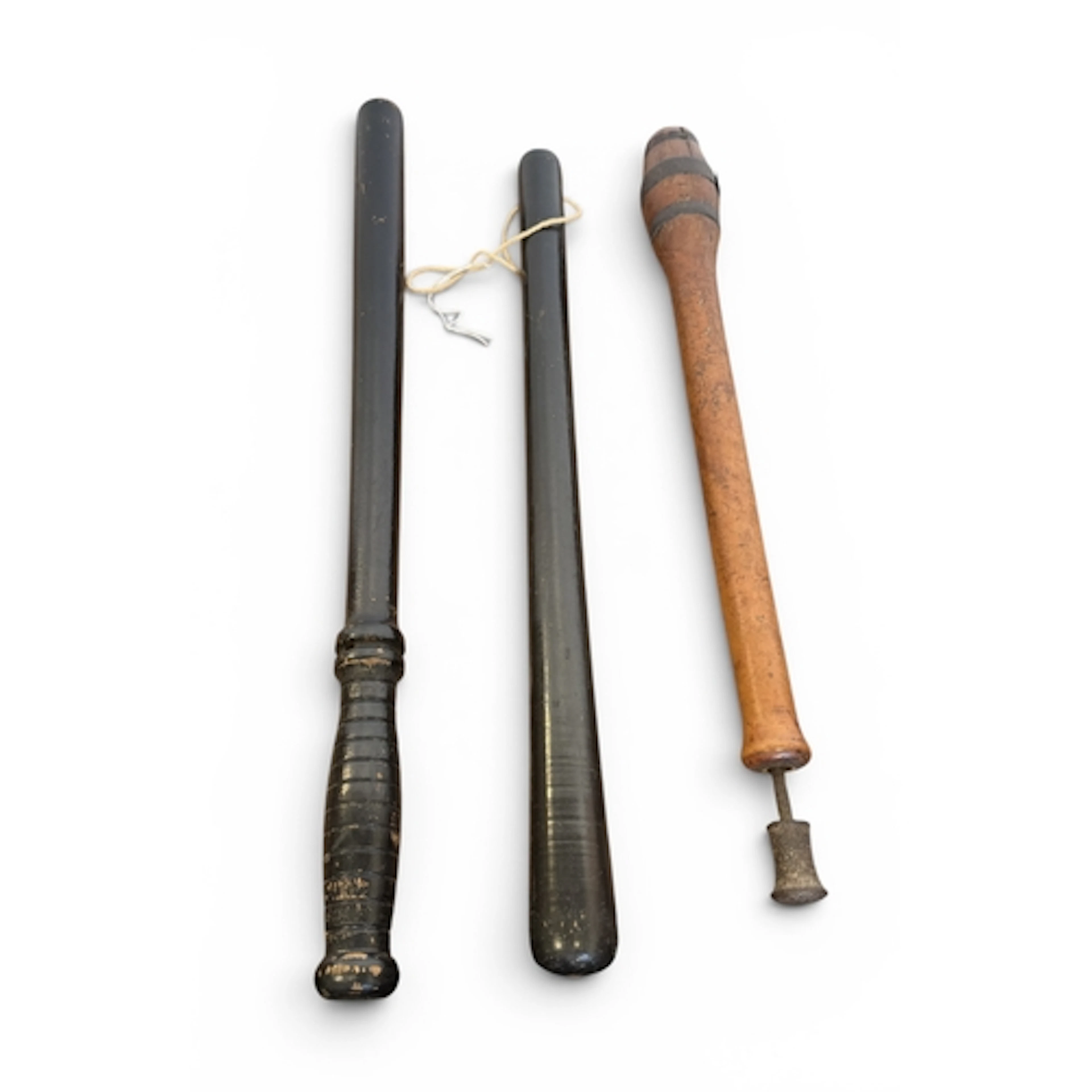 TWO TRUNCHEONS TOGETHER WITH A DOSING GUN