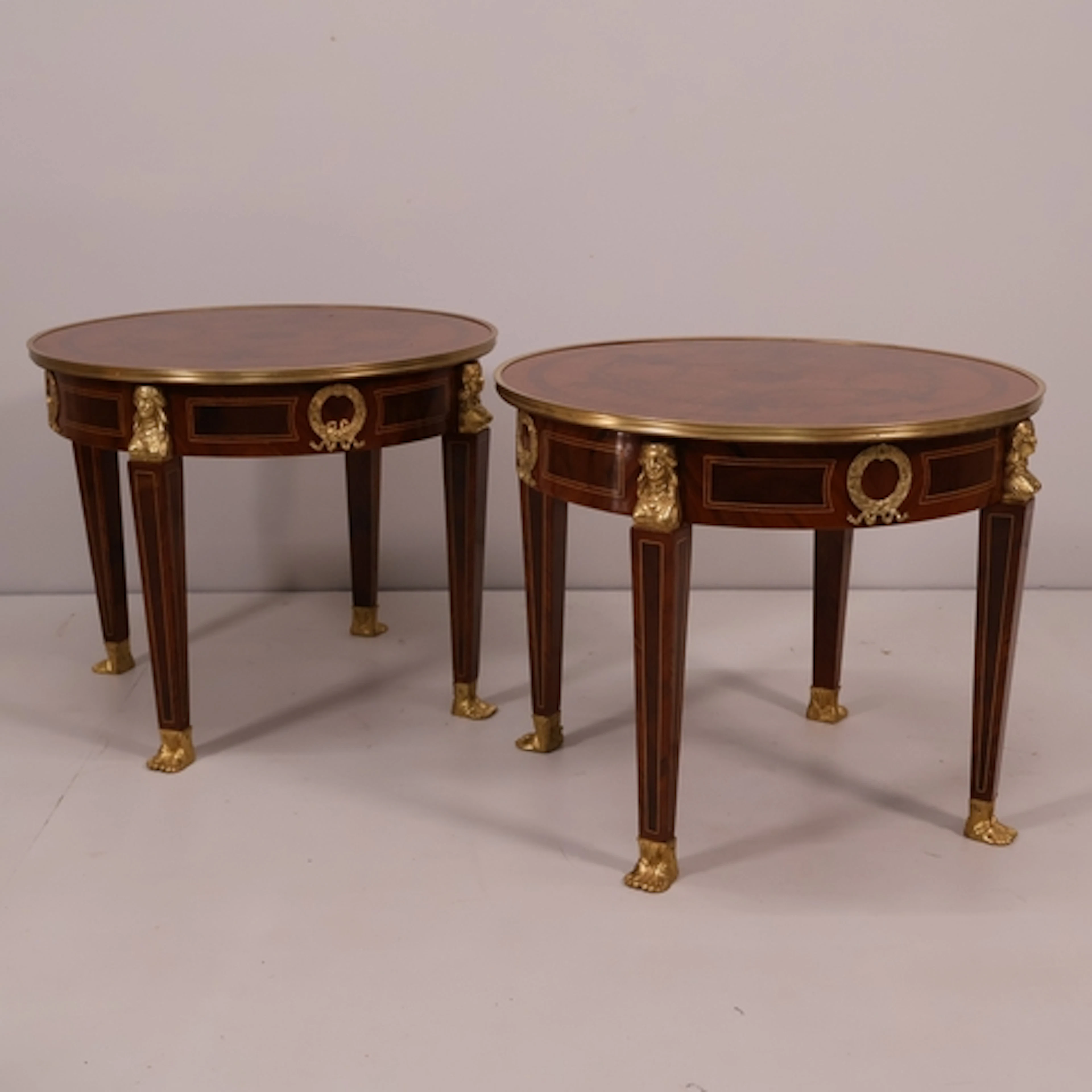 A pair of contemporary continental walnut and kingwood venee...