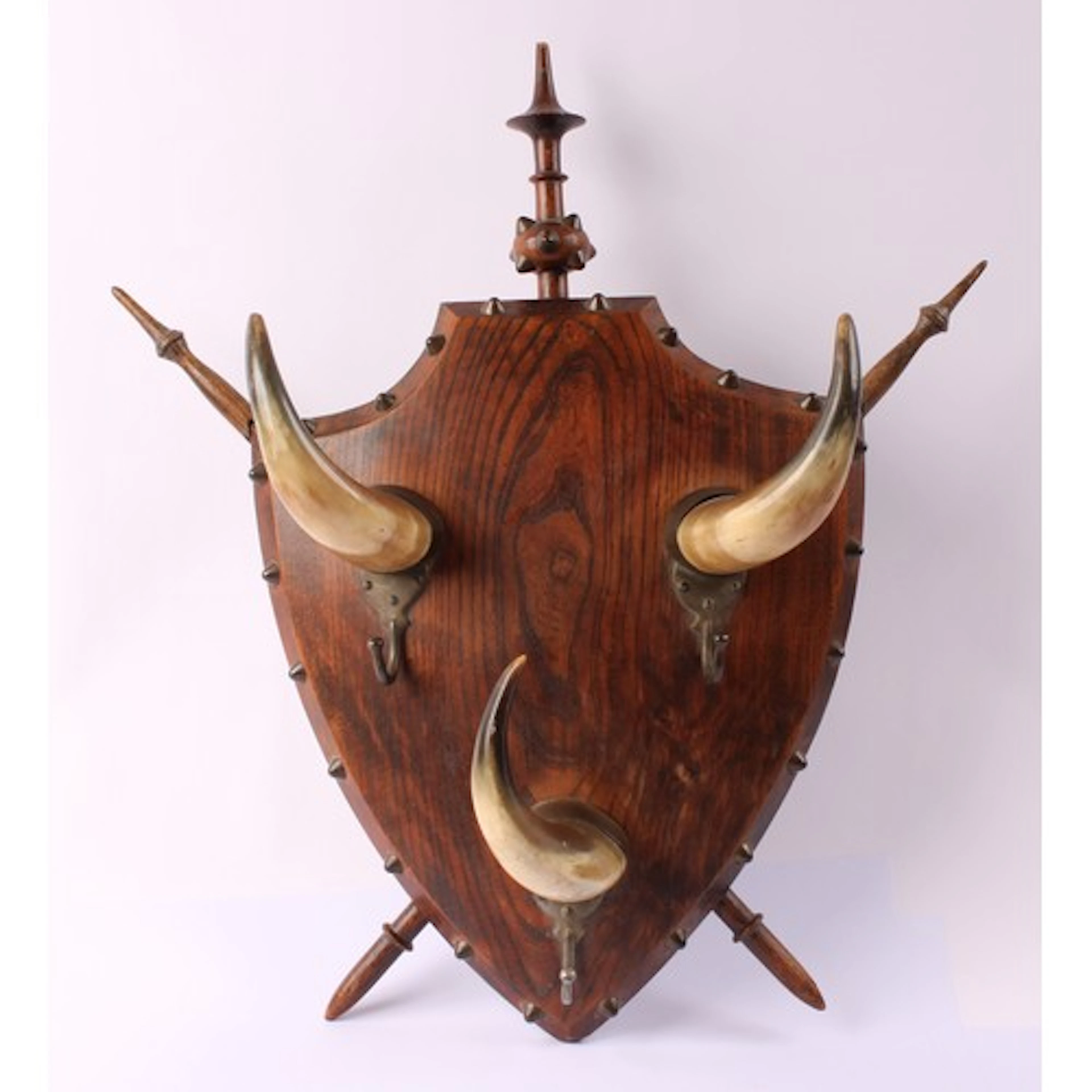 An early 20th century elm country house shield shaped wall h...
