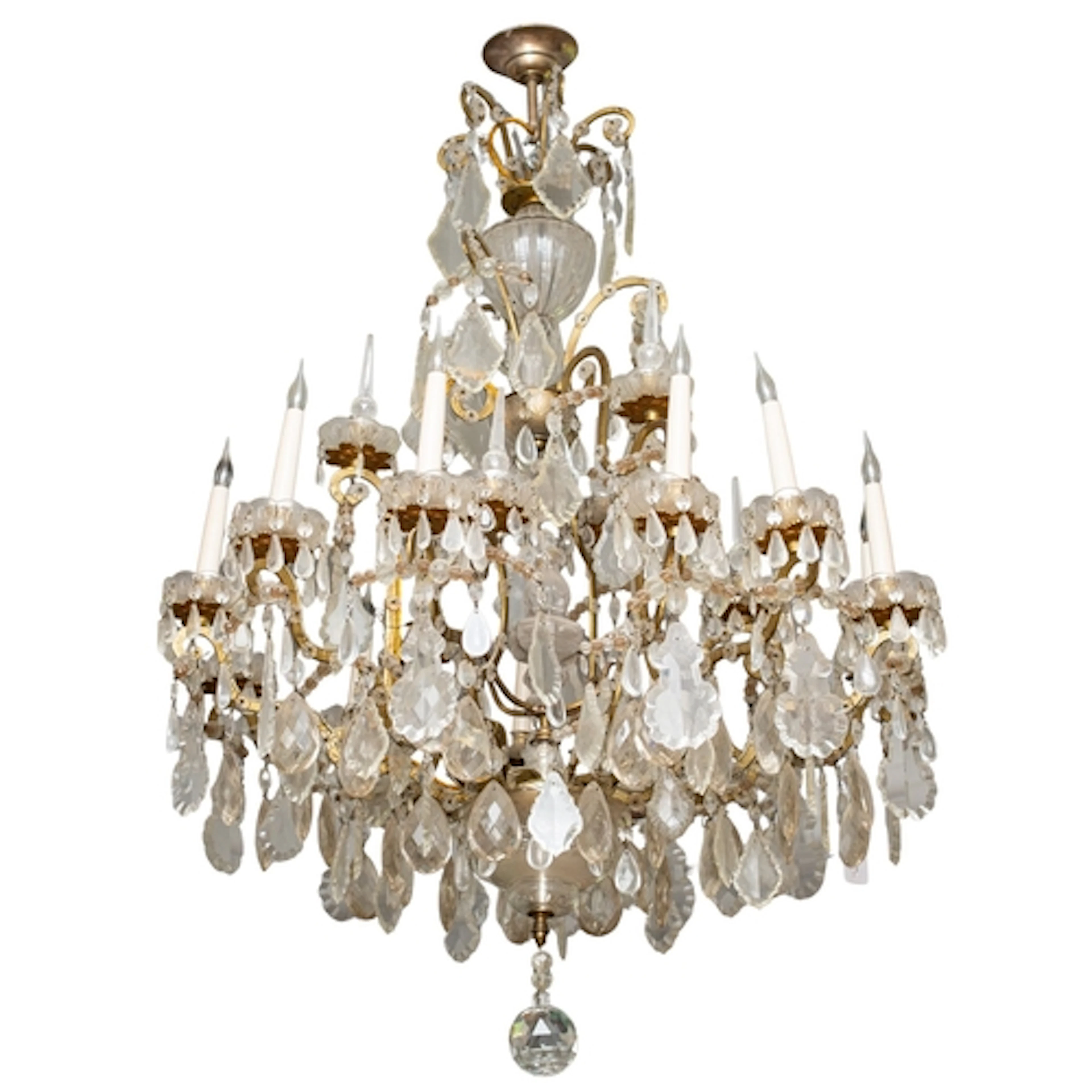 A silvered metal and cut glass twelve light chandelier, in L...