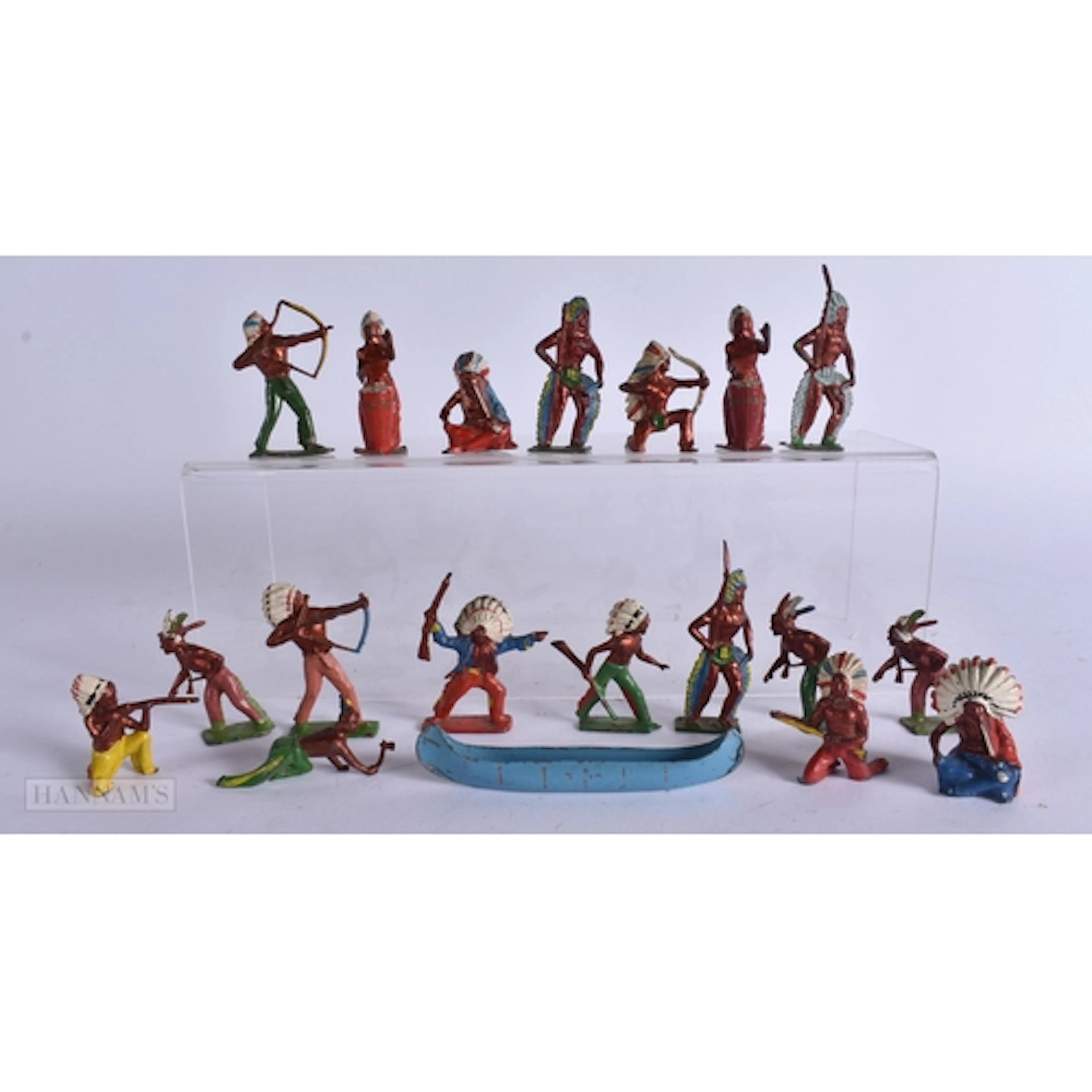 A GROUP OF VINTAGE PAINTED INDIAN CHIEF AND TRIBAL FIGURES. ...