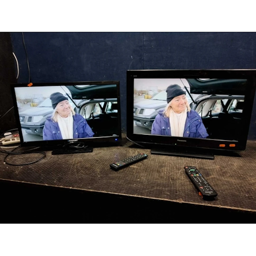 A BLAUPUNKT 24in LED TV with remote and a Panasonic TX-24C3B...