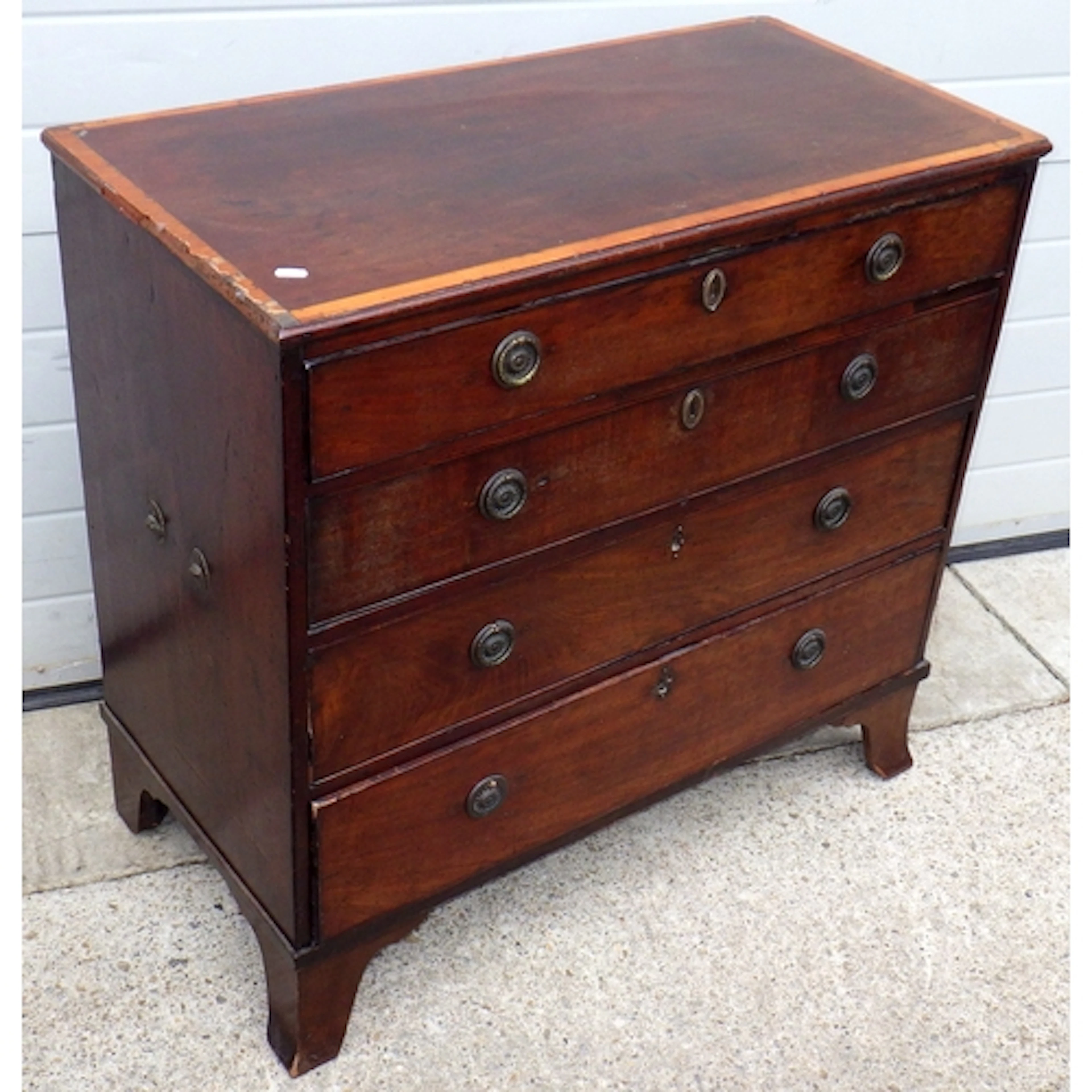 A straight fronted mahogany chest of drawers, moulding a/f, ...