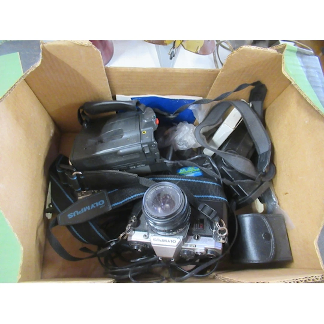 An Olympus camera and other items