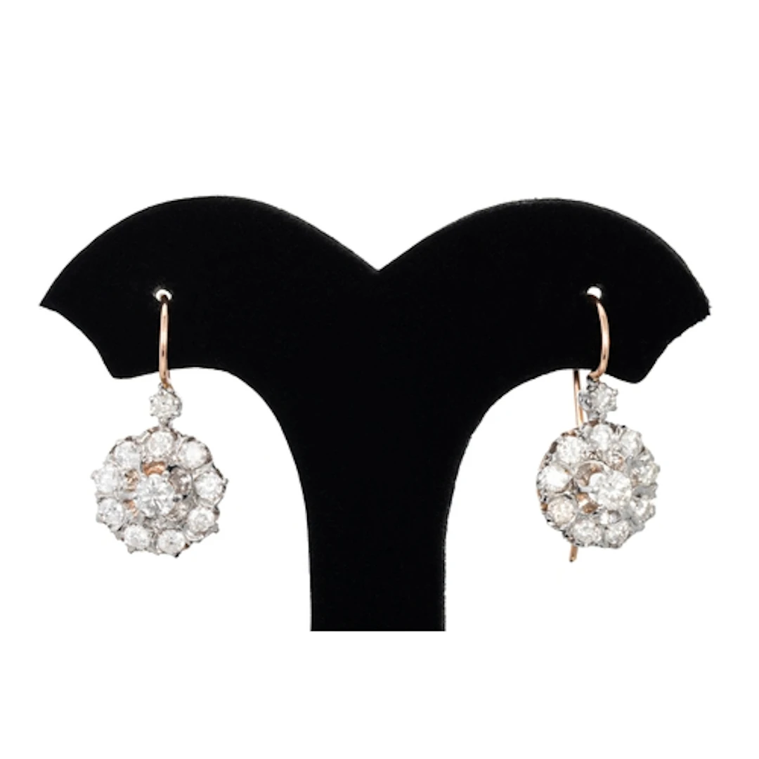 A PAIR OF DIAMOND DROP EARRINGS, mounted in 9ct gold. Estima...