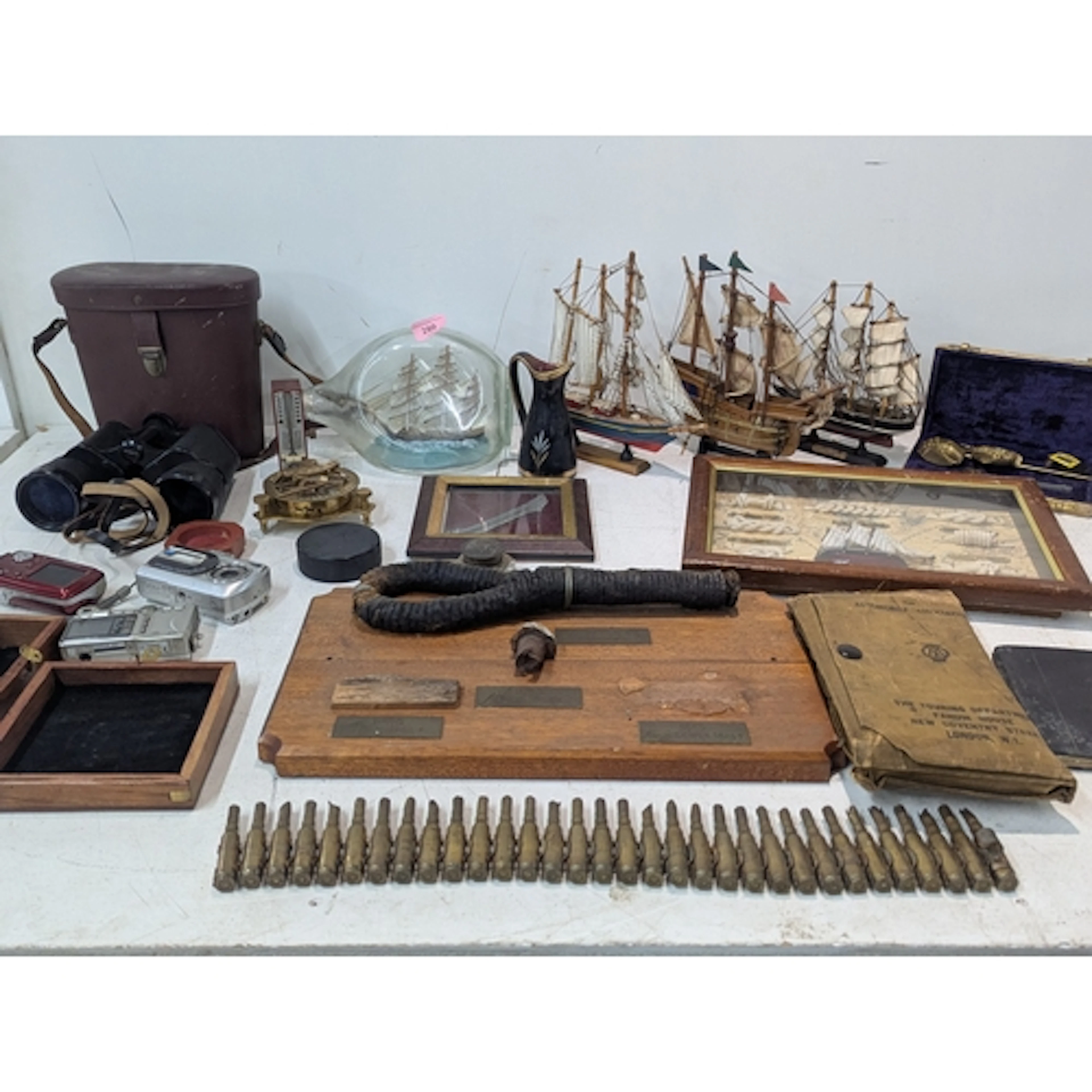 A mixed lot to include model ships, a set of vintage binocul...