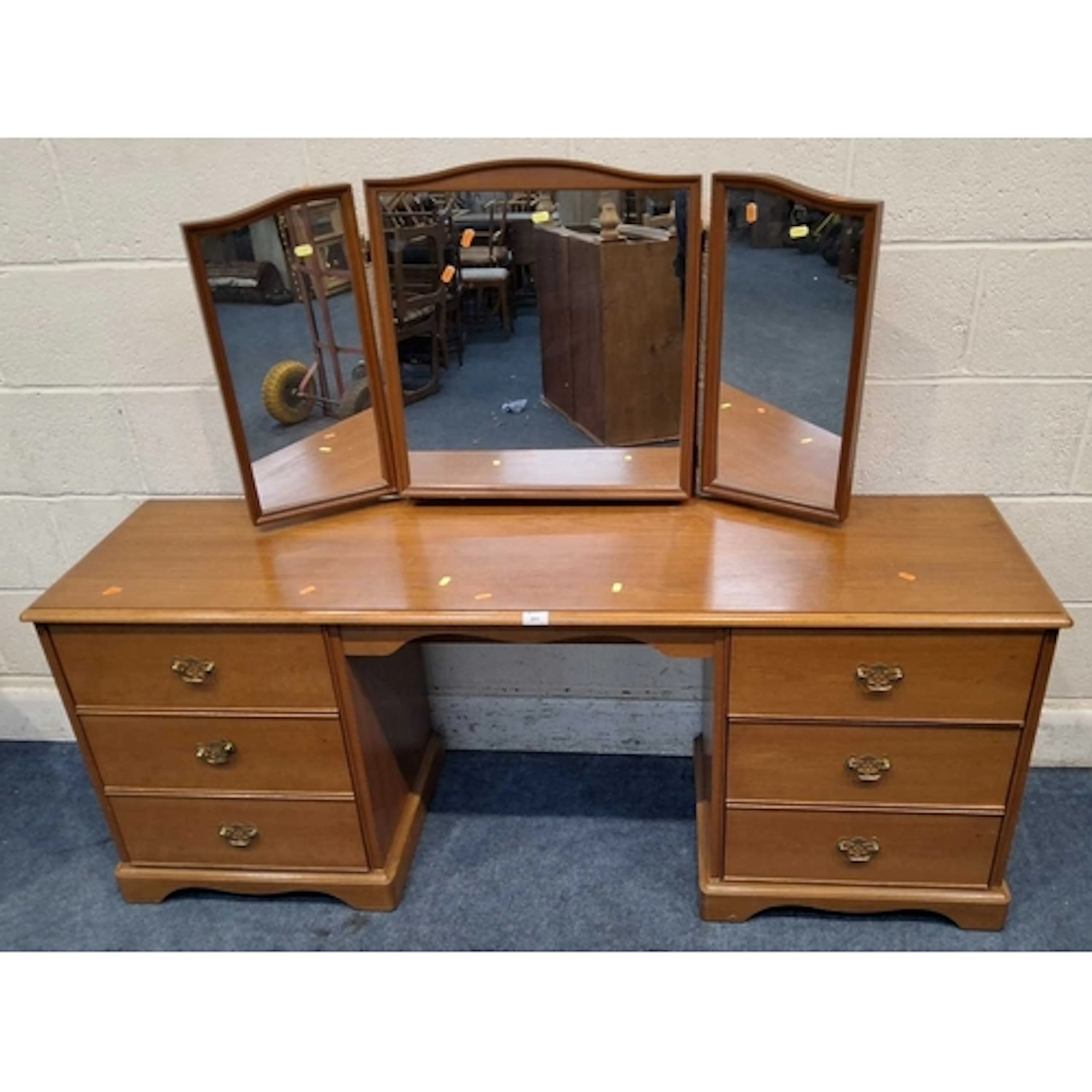 A STAG DRESSING TABLE, with a triple mirror, fitted with two...
