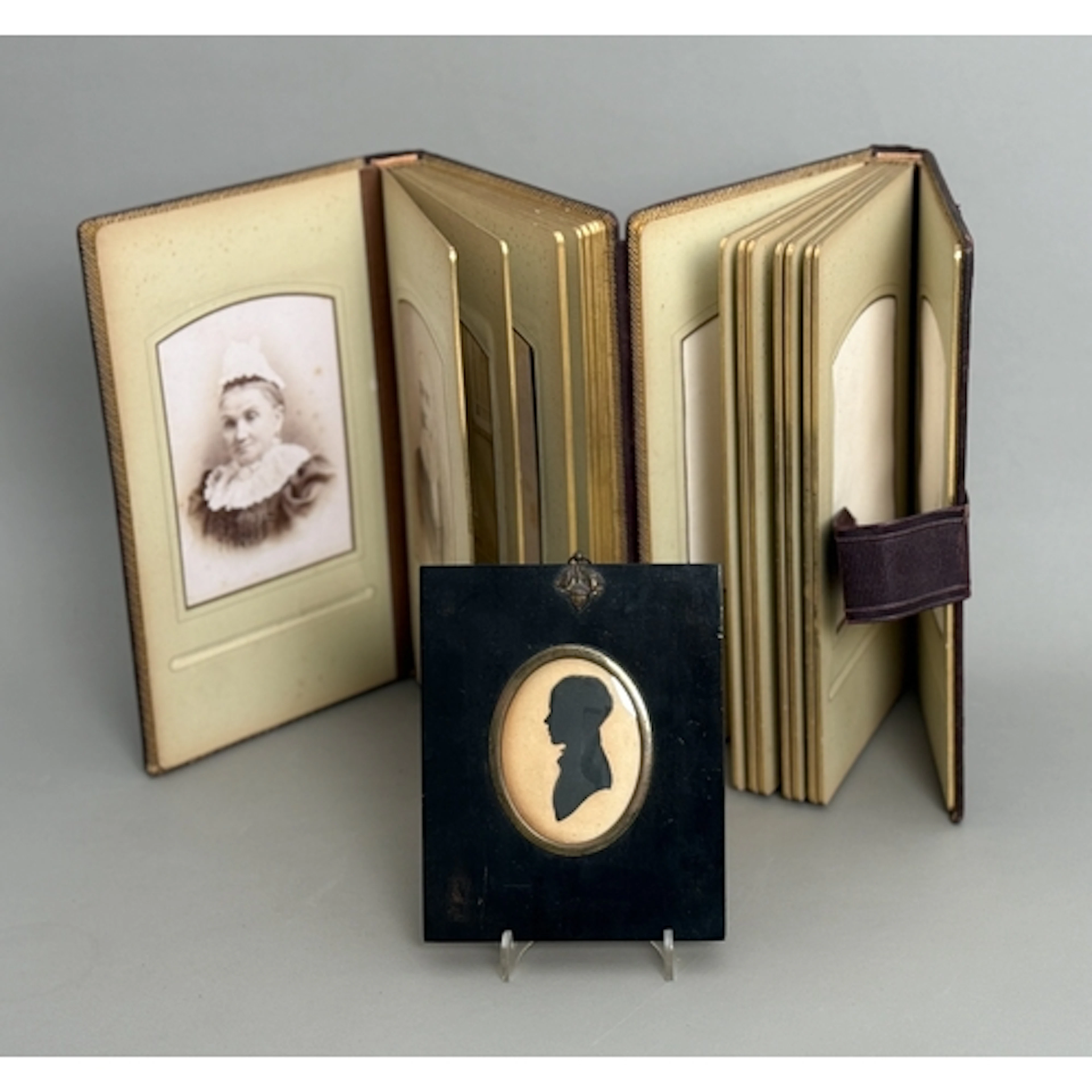 An early 19th century framed silhouette of a young boy, 'Nic...
