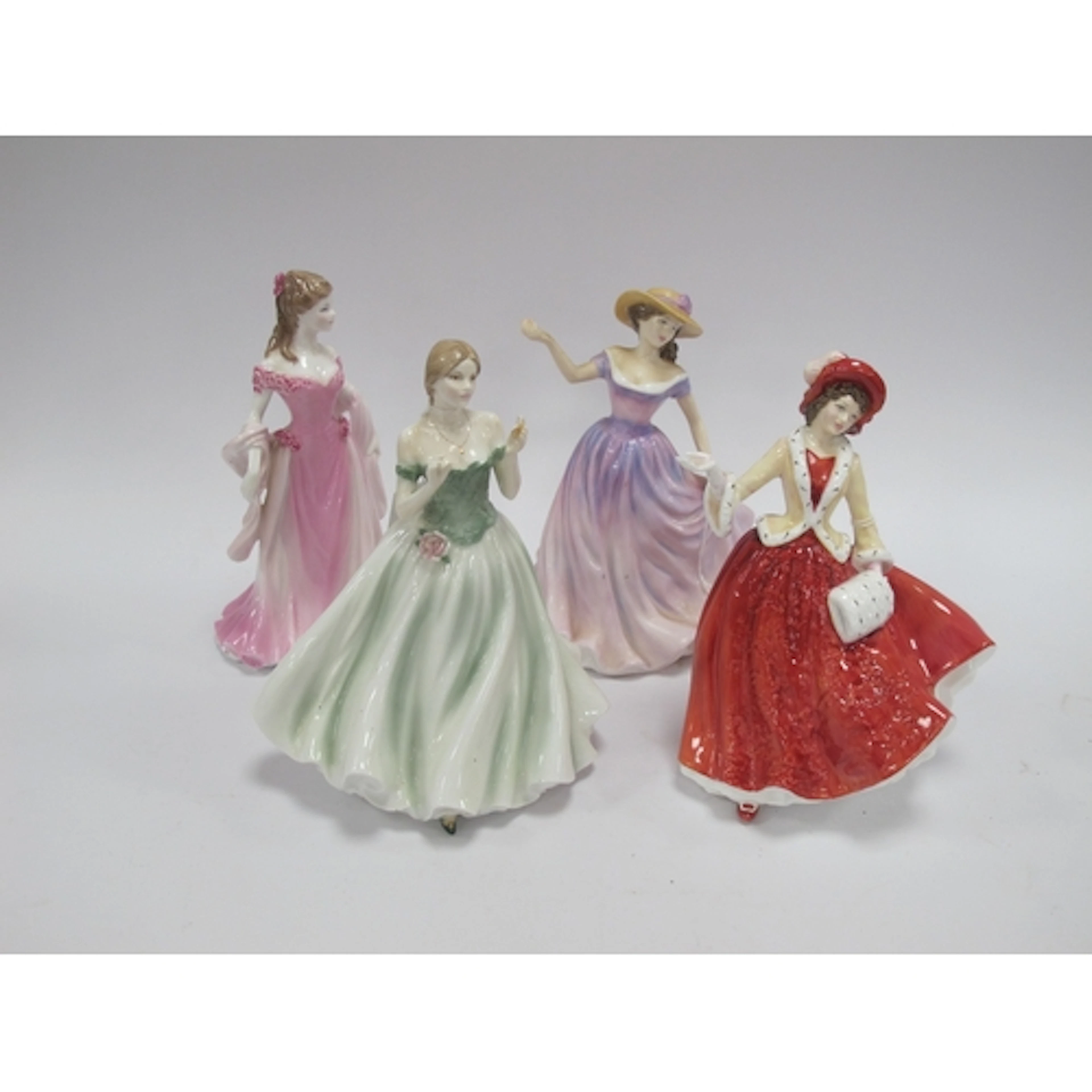 Two Royal Worcester and Two Royal Doulton Figurines. (all wi...