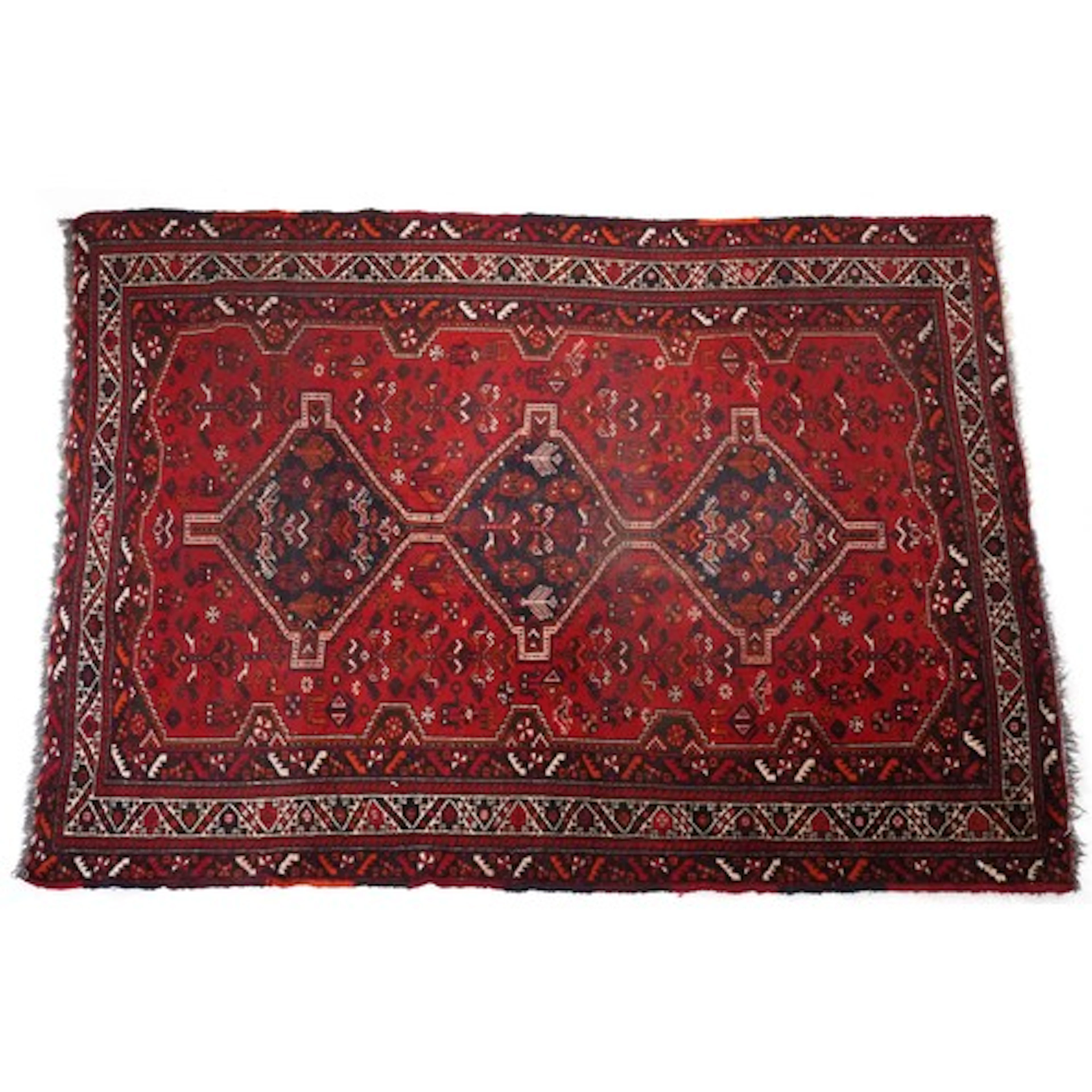 Persian Qashqai style rug, having a geometric diamond shaped...