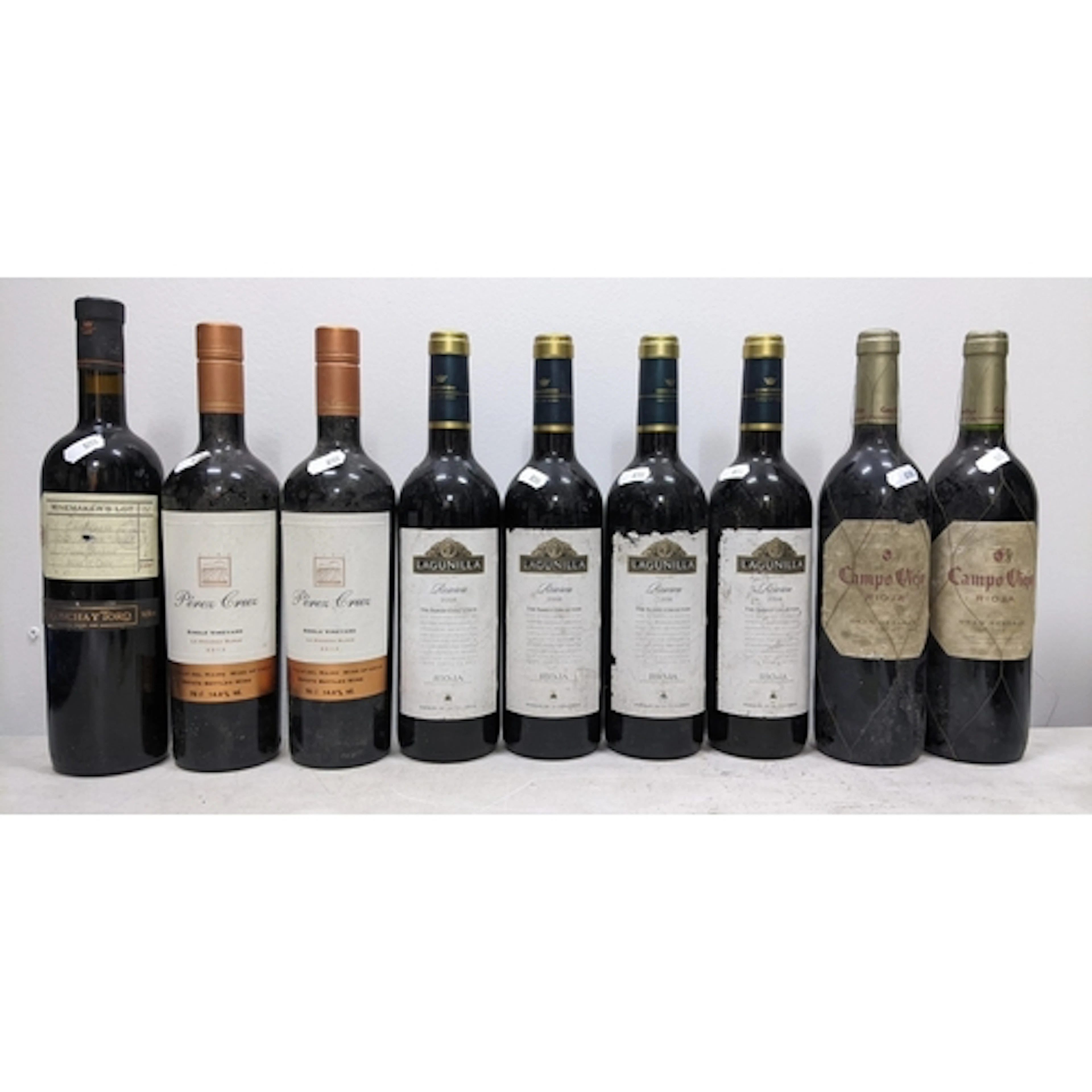 Nine bottles of Chilean and Spanish red wine, comprising:- -...