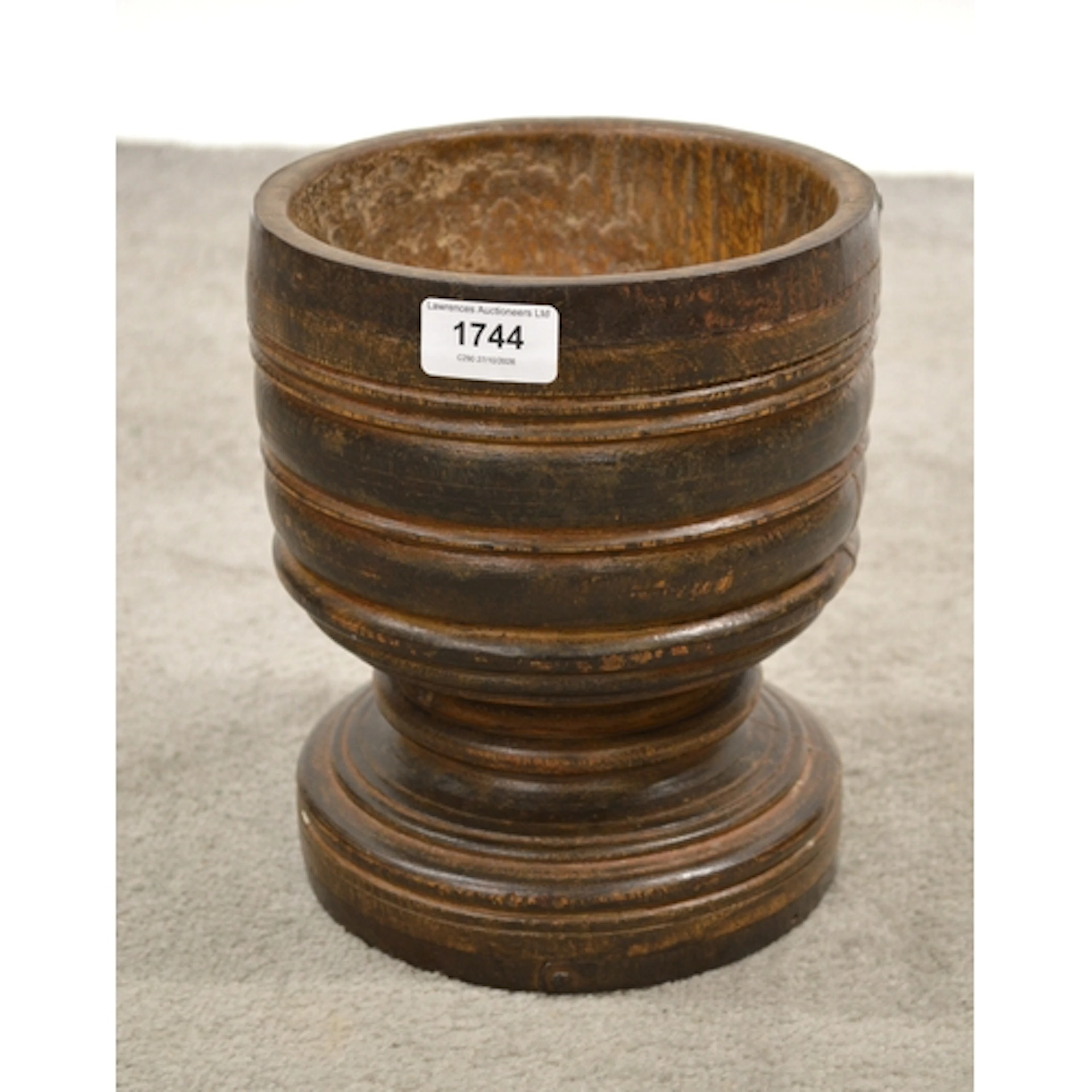 Antique treenware and iron bound mortar, 23cm high