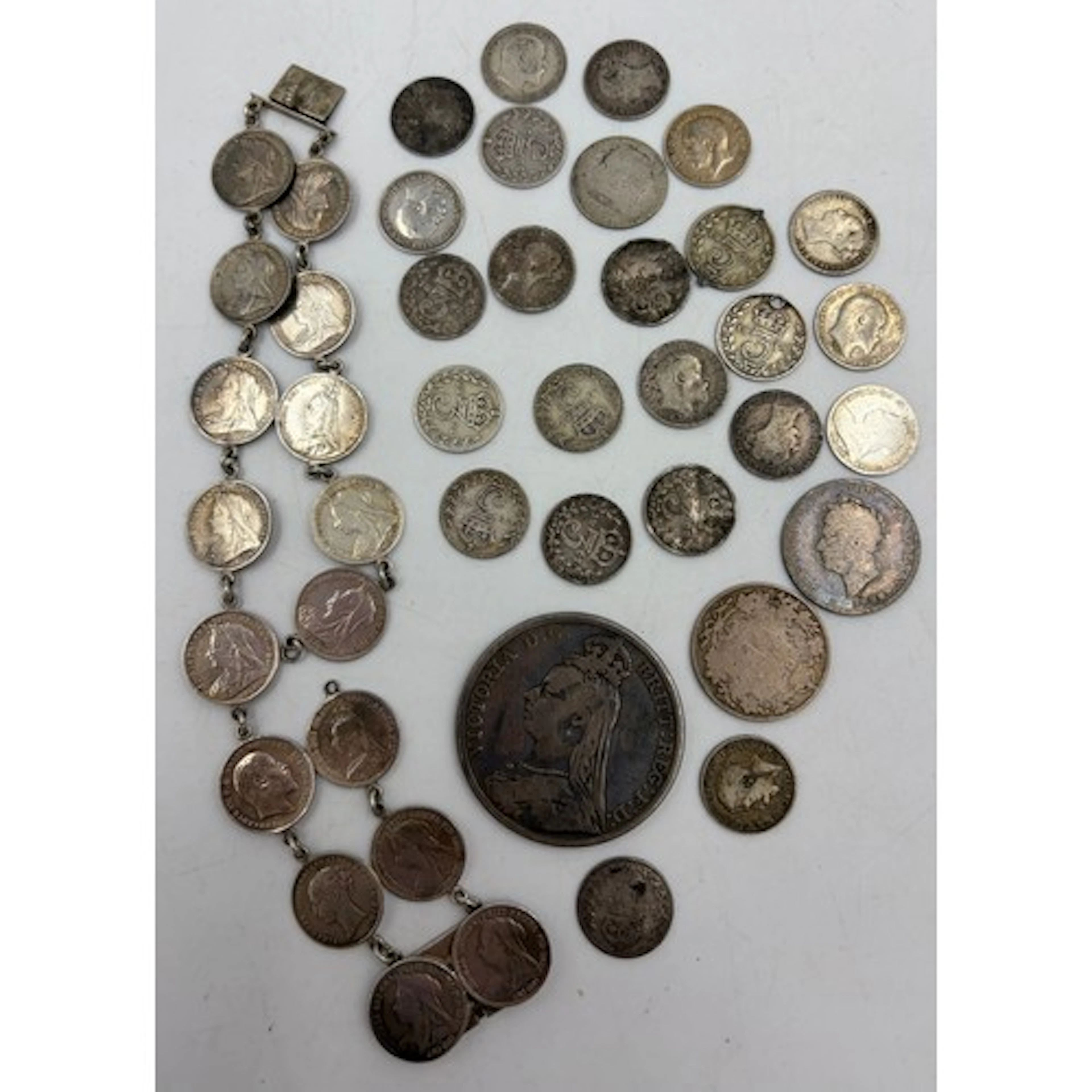 A collection of GB silver coinage pre-1921 to include a brac...