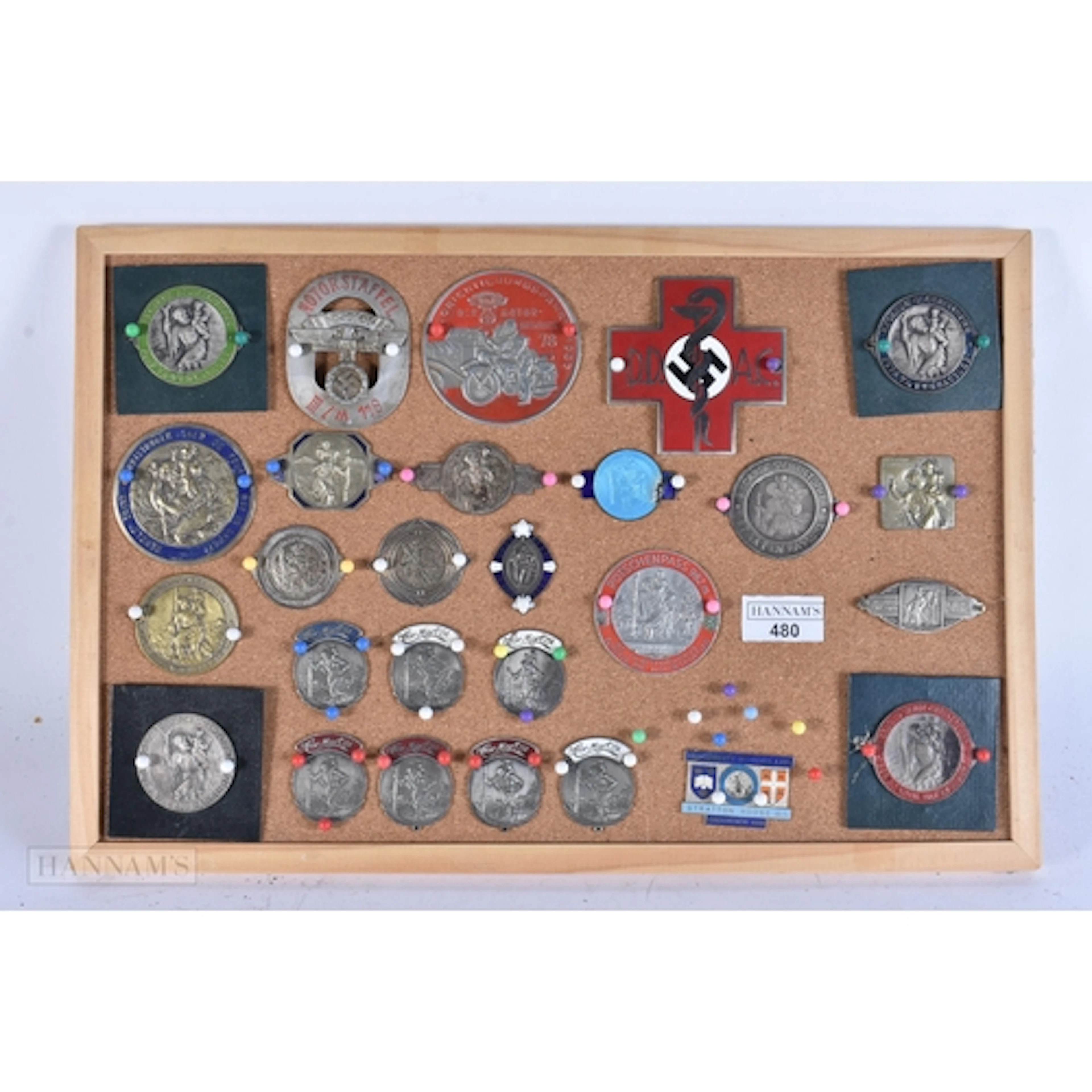 A FRAMED DISPLAY OF VINTAGE MOTORING BADGES etc. (qty)