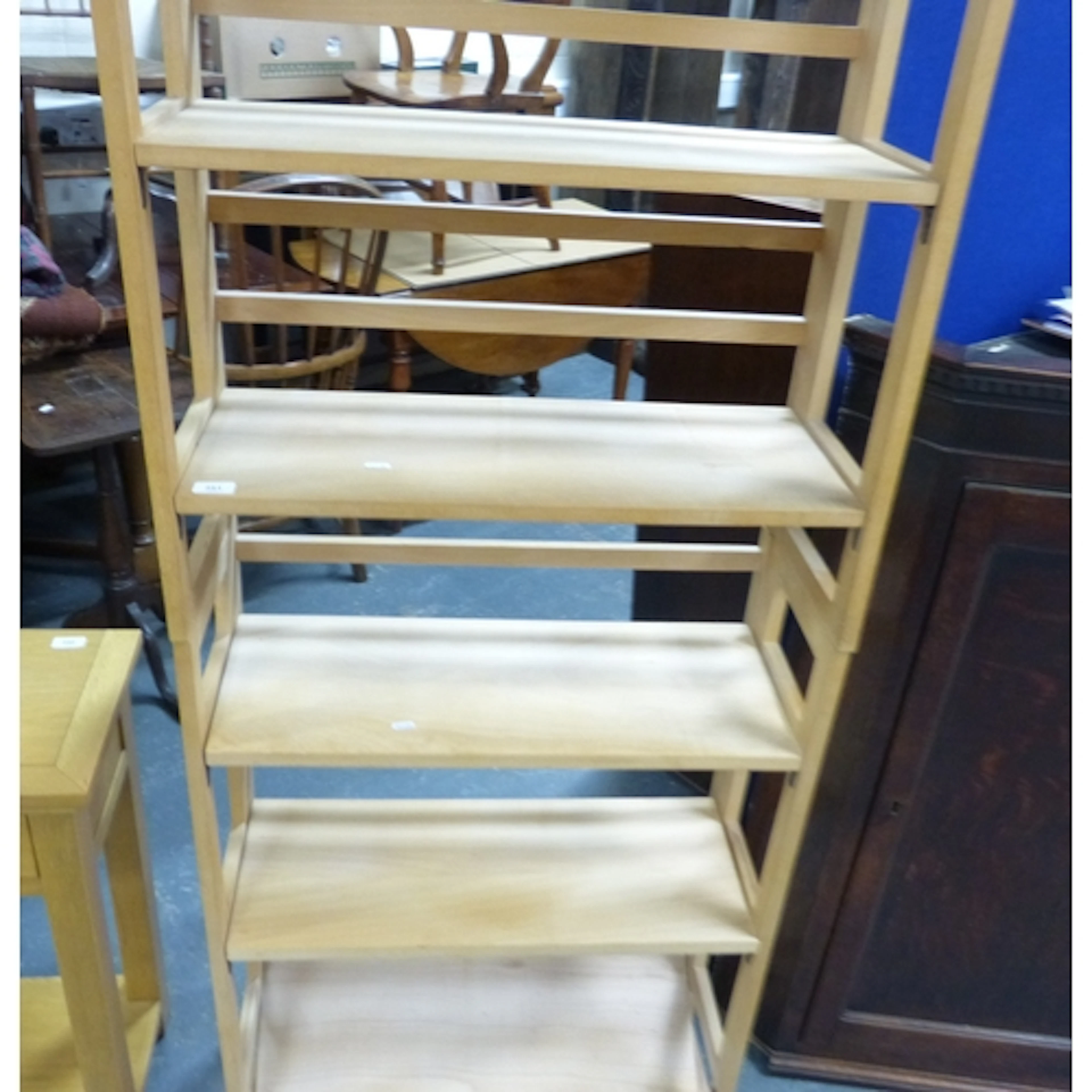 Two stacking vintage book shelves.