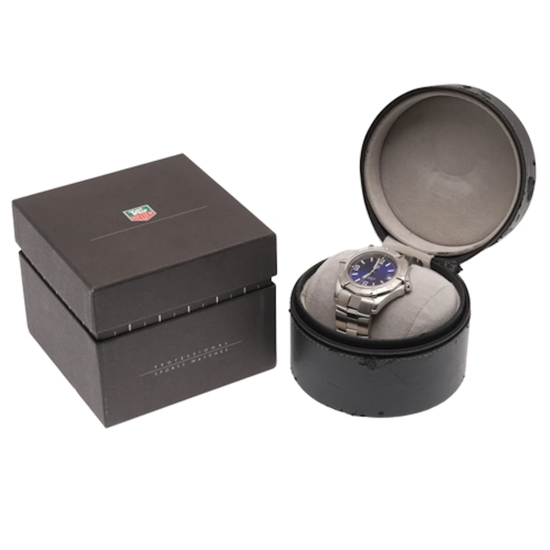 A GENTLEMAN'S STAINLESS STEEL PROFESSIONAL WRISTWATCH BY TAG...
