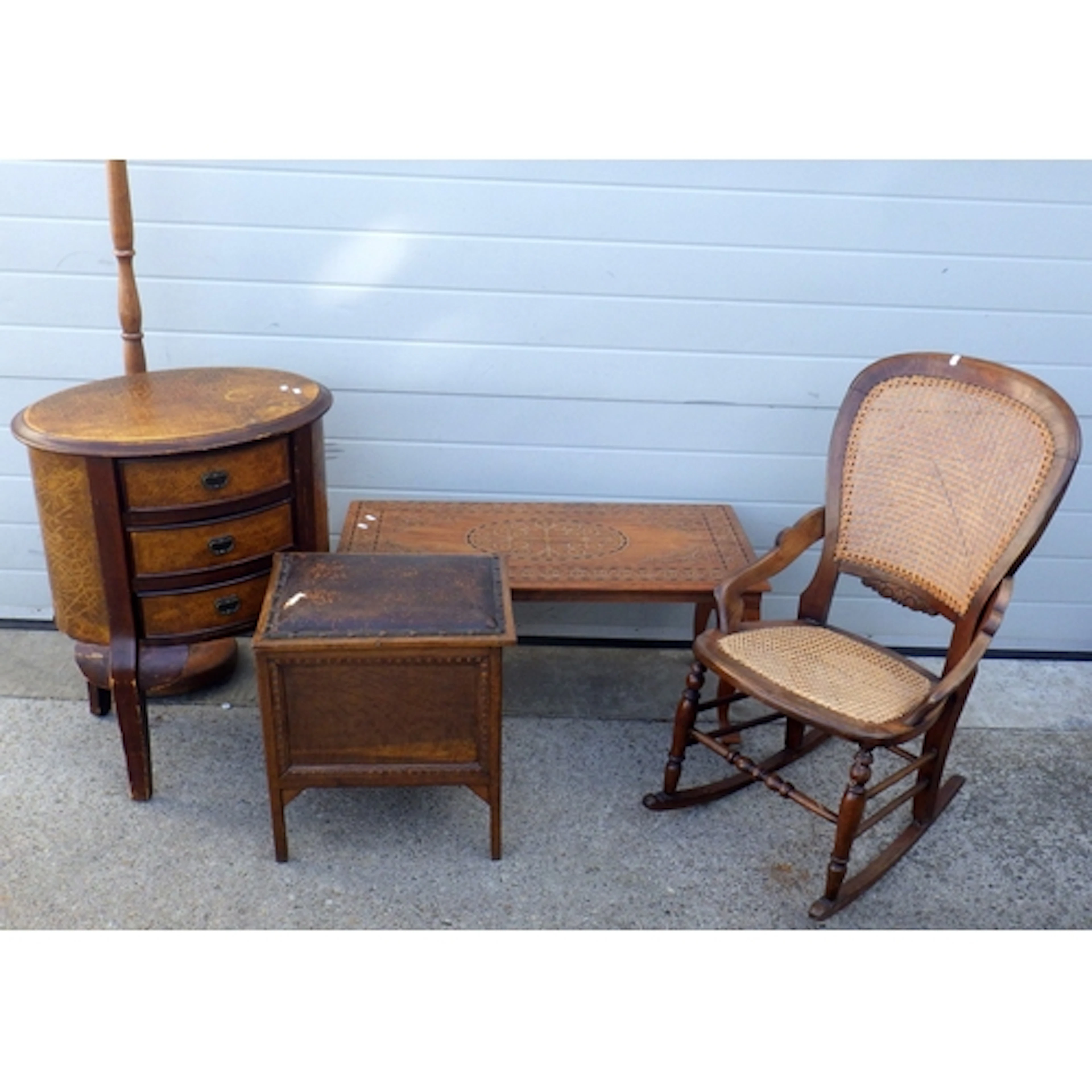 An oval chest, caned rocking chair, box stool, coffee table ...