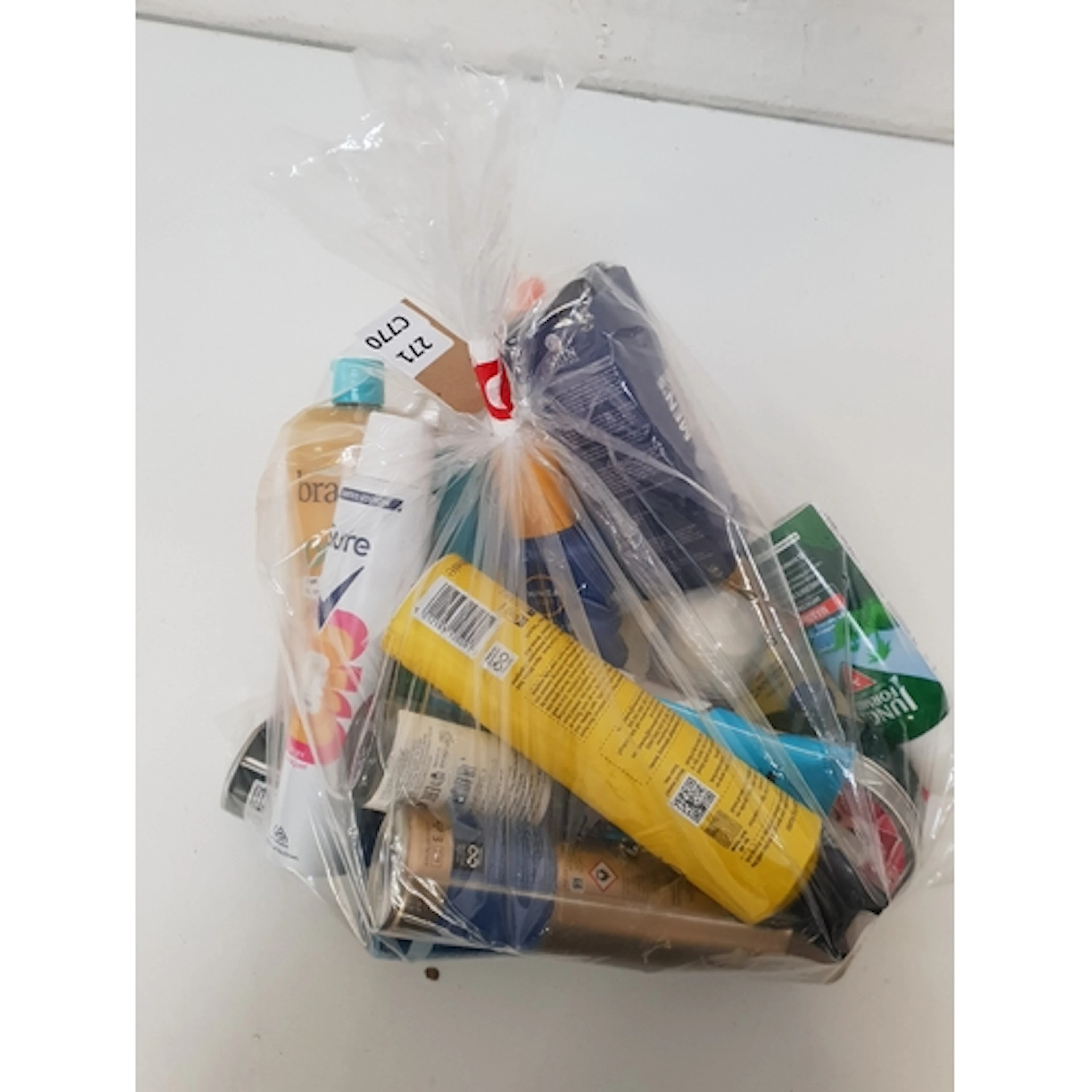 ONE BAG OF USED COSMETICS including Nivea and Malibu