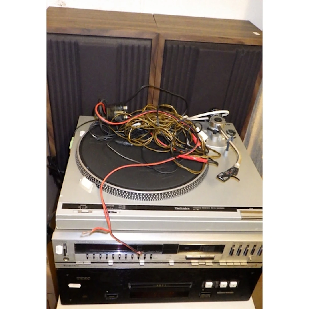 A Technics record player, further stereo equipment, pair spe...
