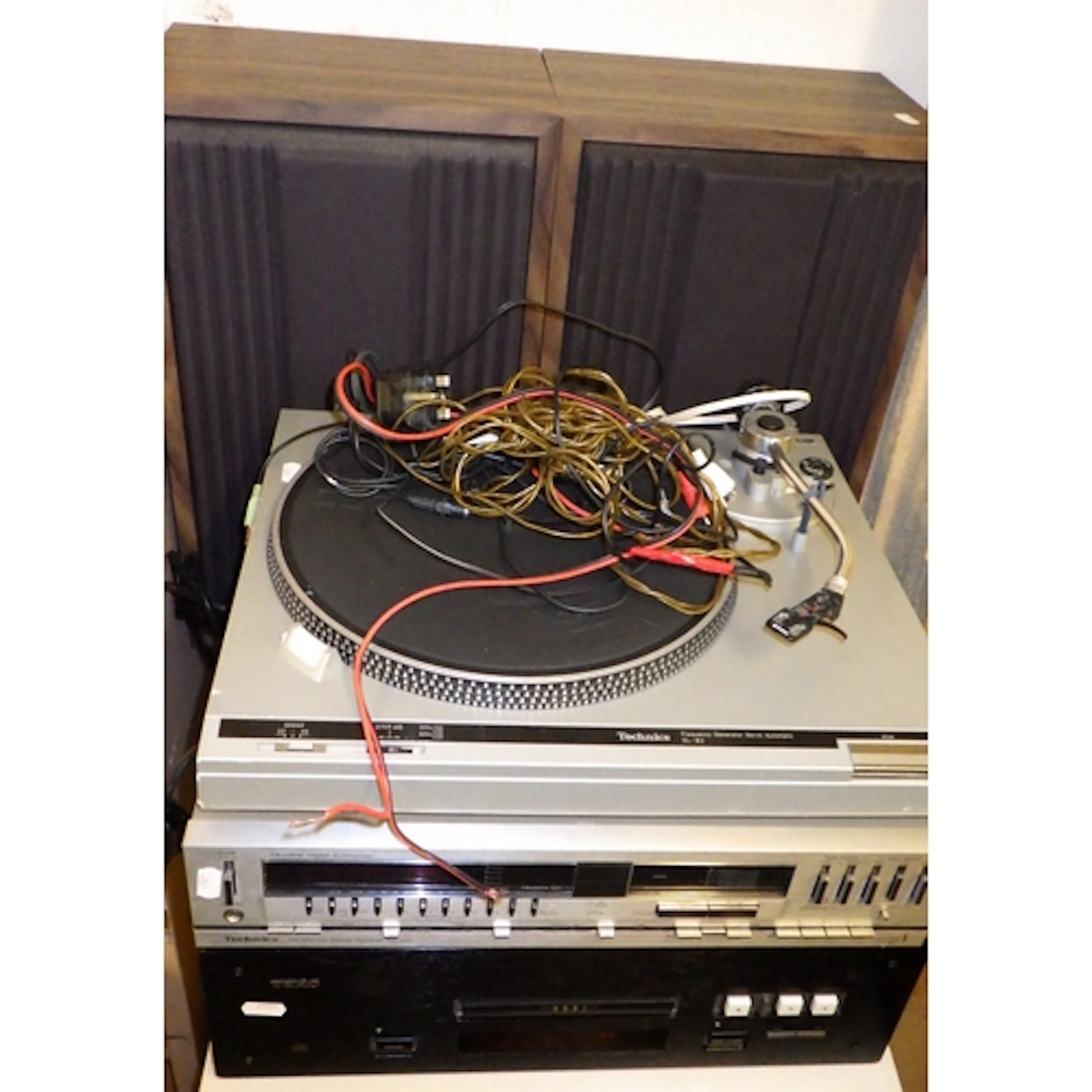A Technics record player, further stereo equipment, pair spe...