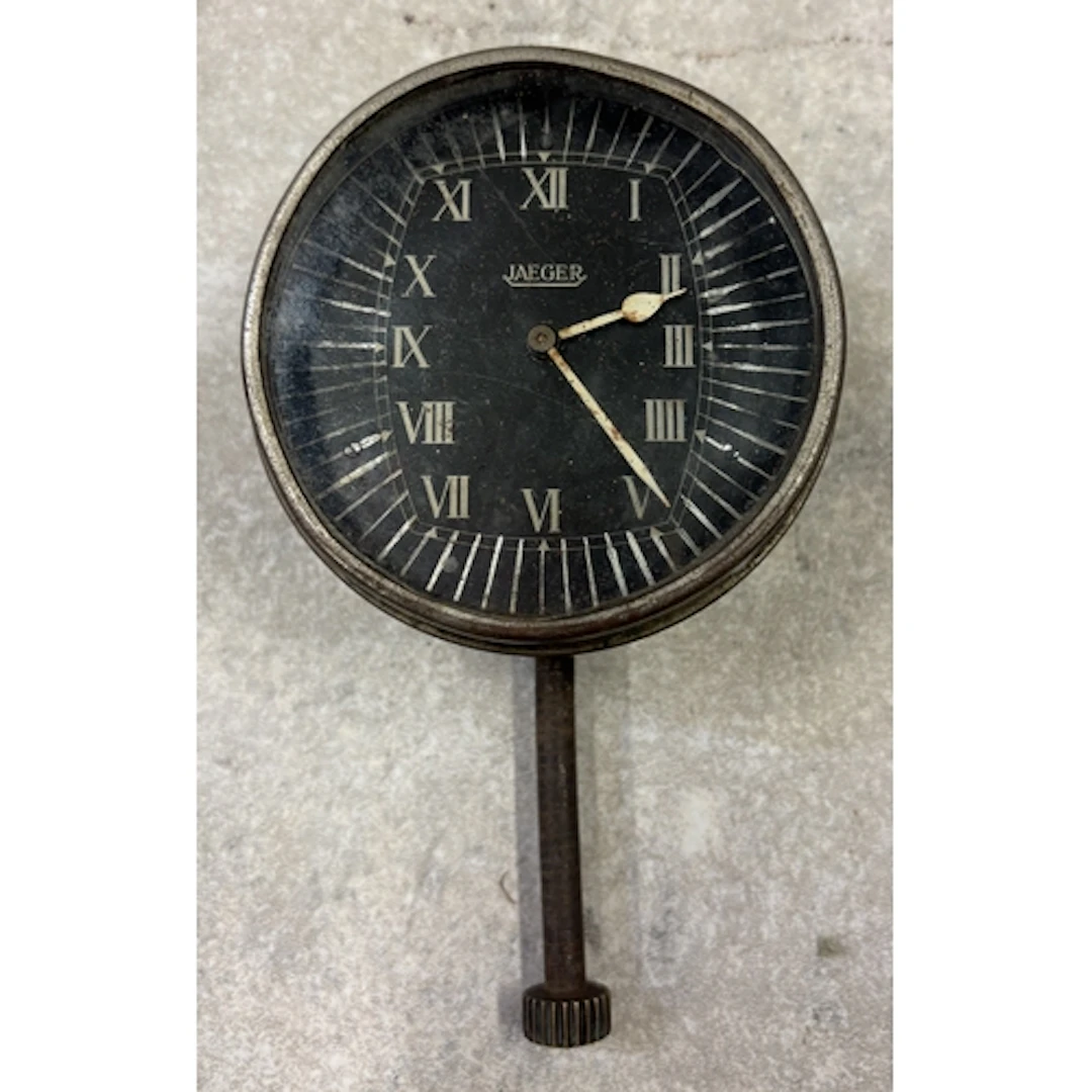 A 1930s Jaeger eight-day mechanical dashboard clock. Est. £2...