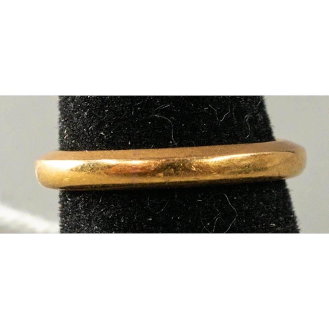 Jewellery: a 22ct yellow gold wedding band, width 2.6mm, UK ...