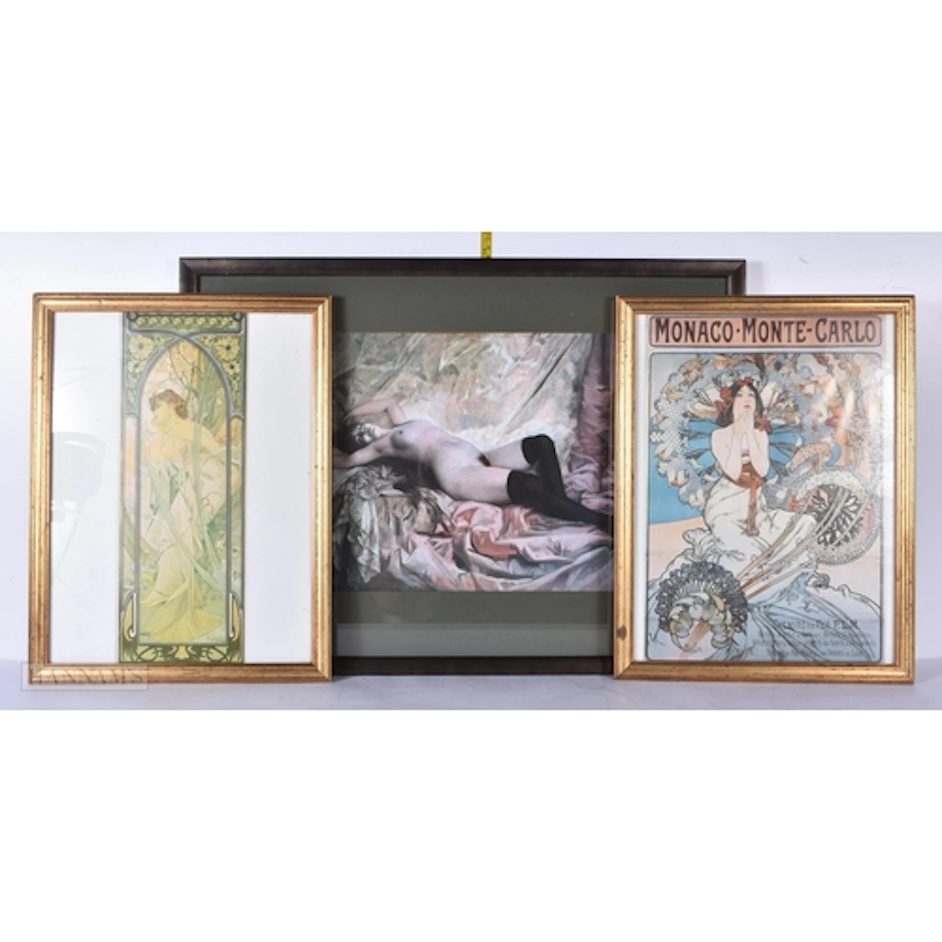 A framed print of a reclining nude female together with two ...