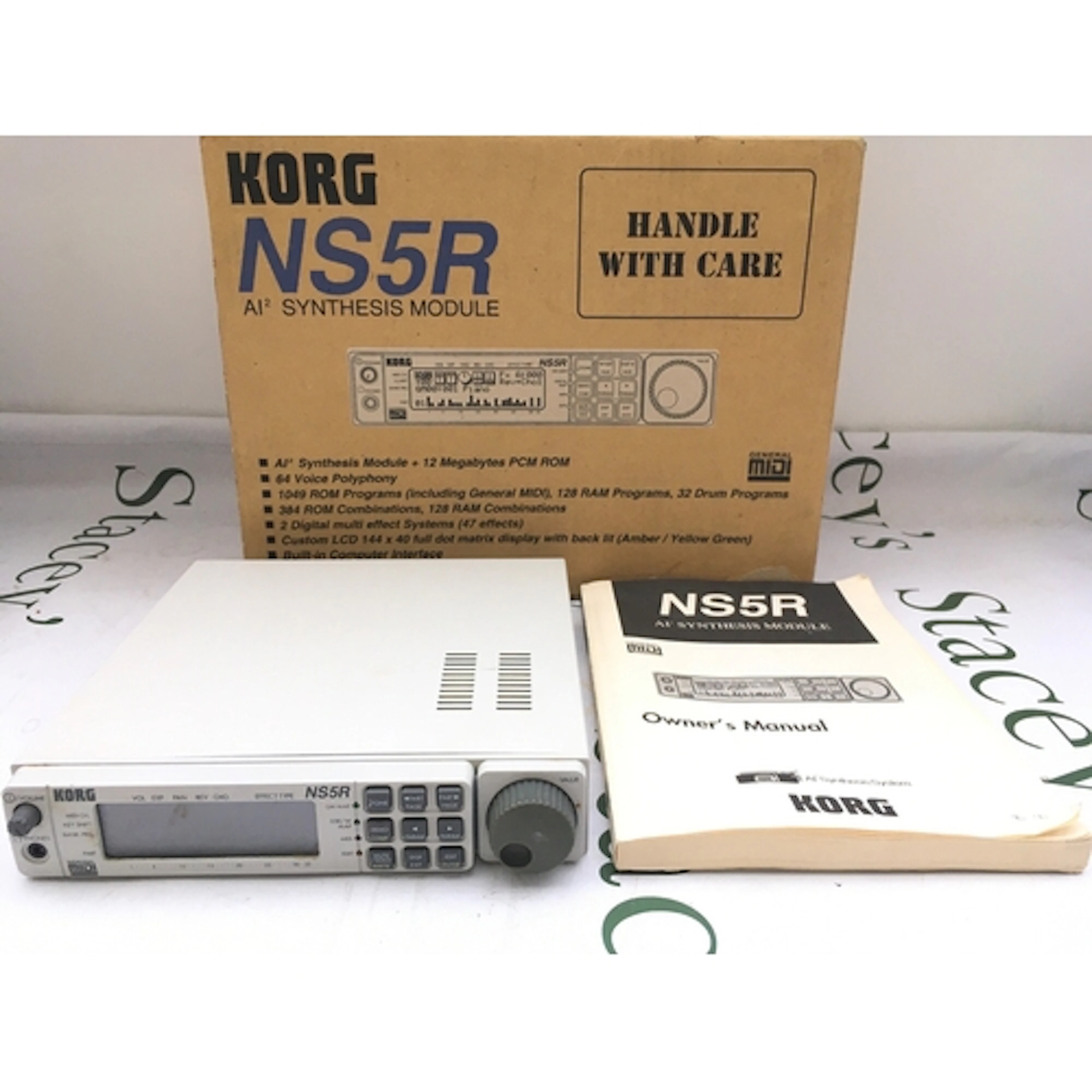 A boxed Korg NS5R AI2 synthesizer module. Comes with instruc...