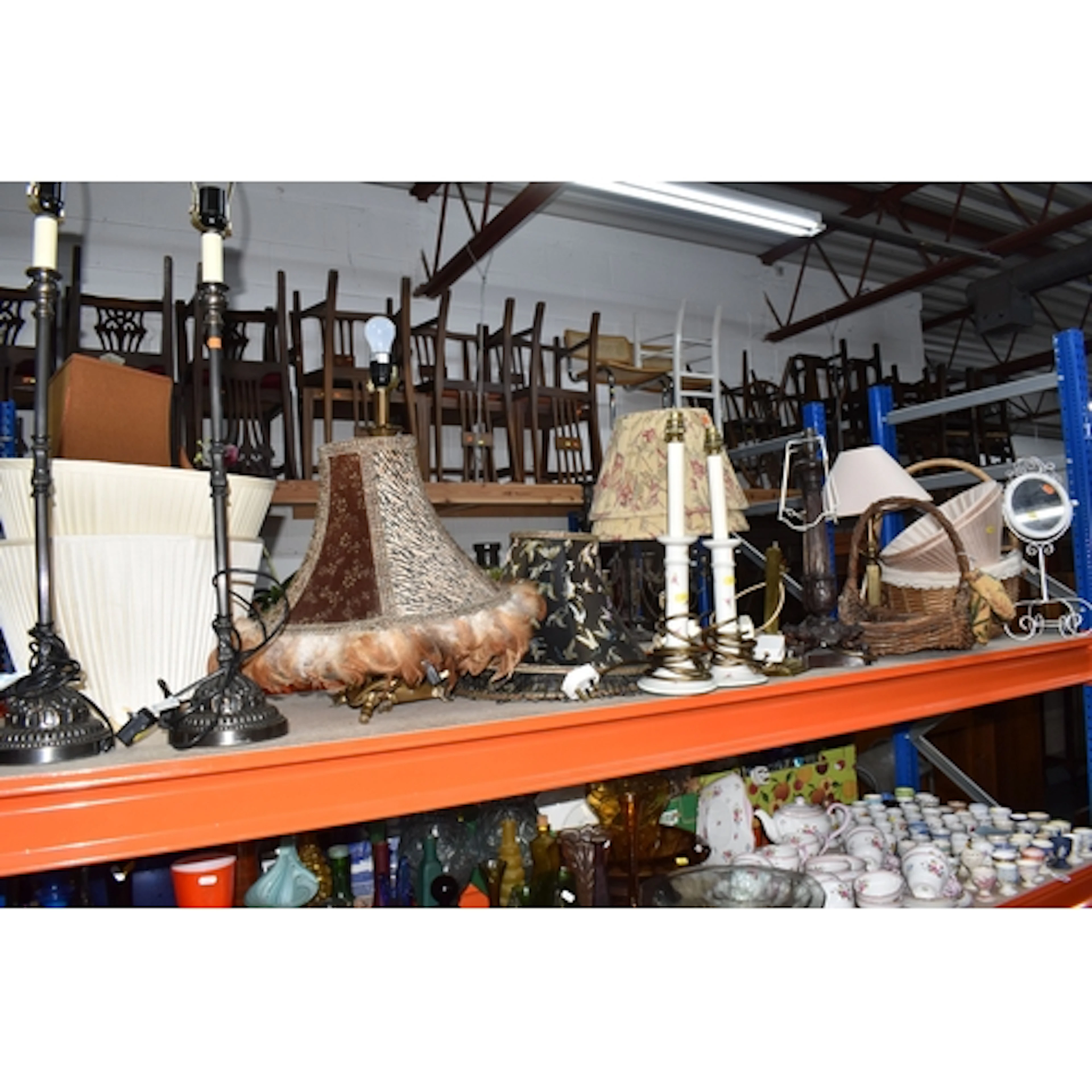 A GROUP OF TABLE LAMPS, BASKETS AND A MIRROR, comprising thr...