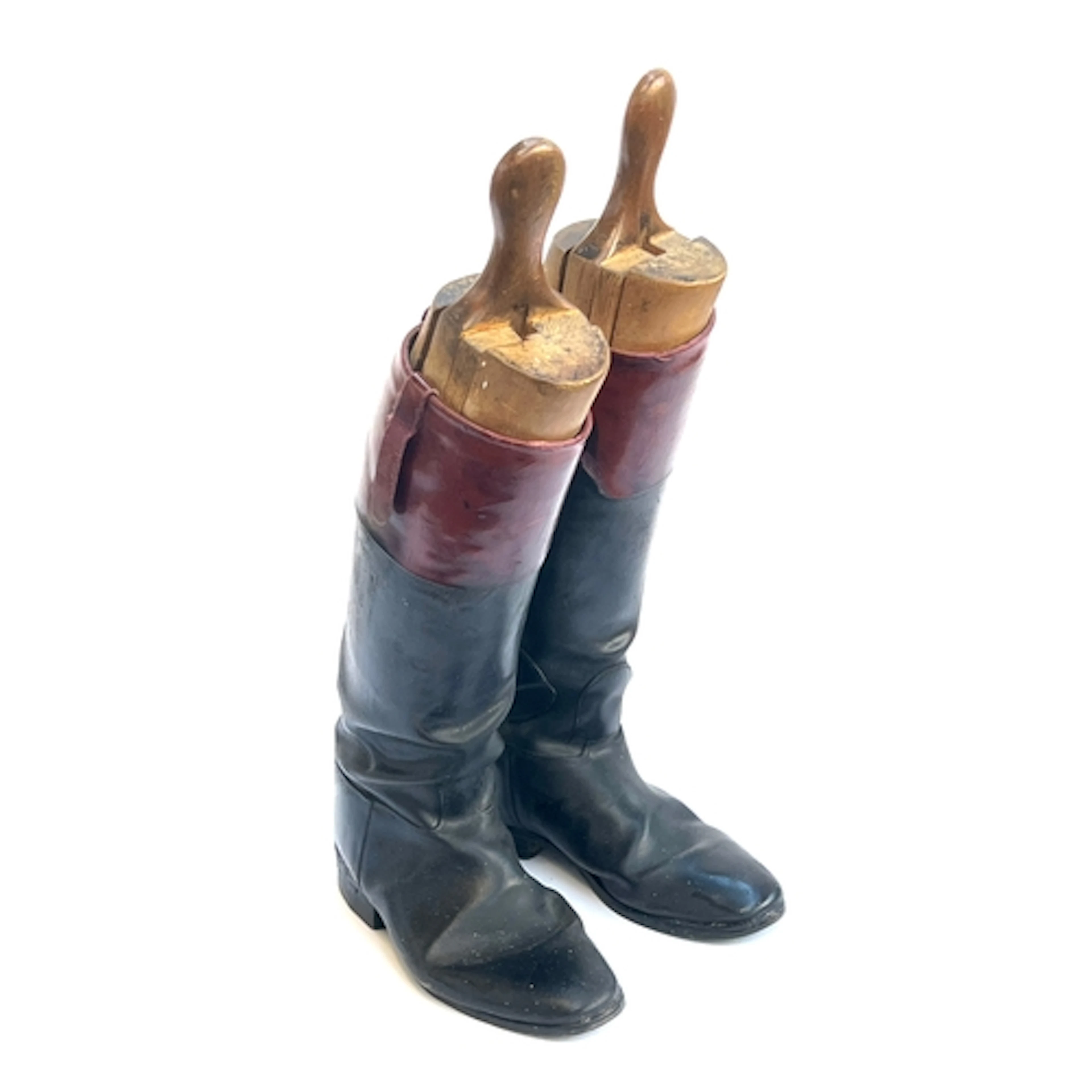 A further pair of black leather riding boots with mahogany t...