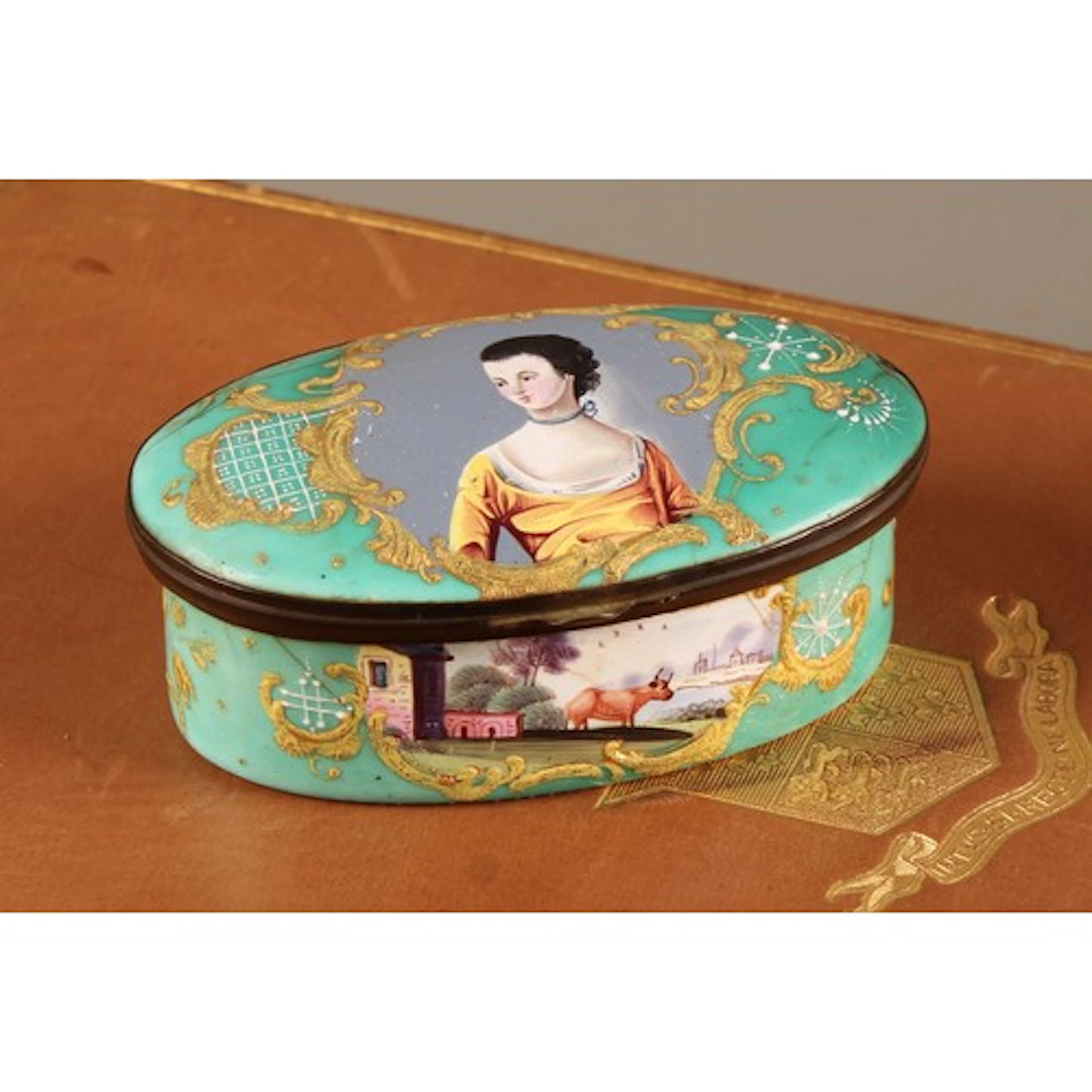 A George III South Staffordshire enamel waisted oval snuff b...