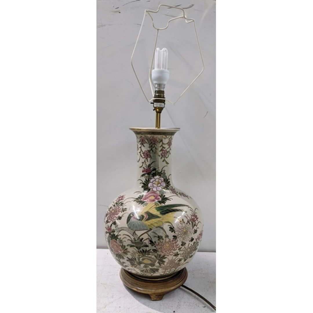 A 20th century Japanese porcelain vase/table lamp, painted w...